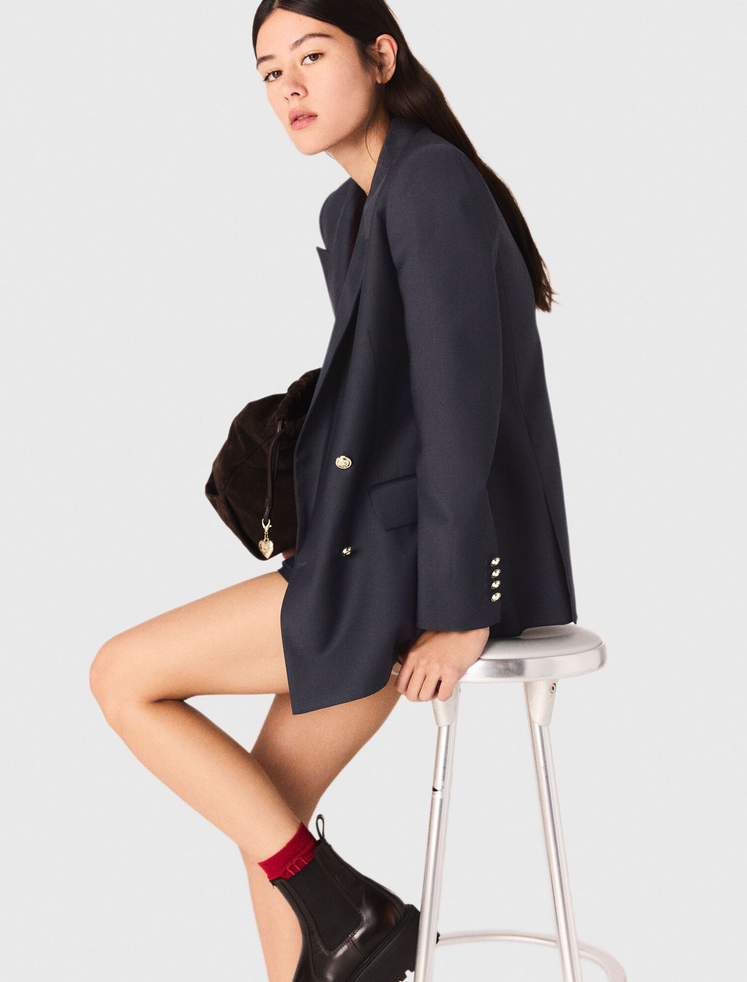 Suit jacket with gold buttons
