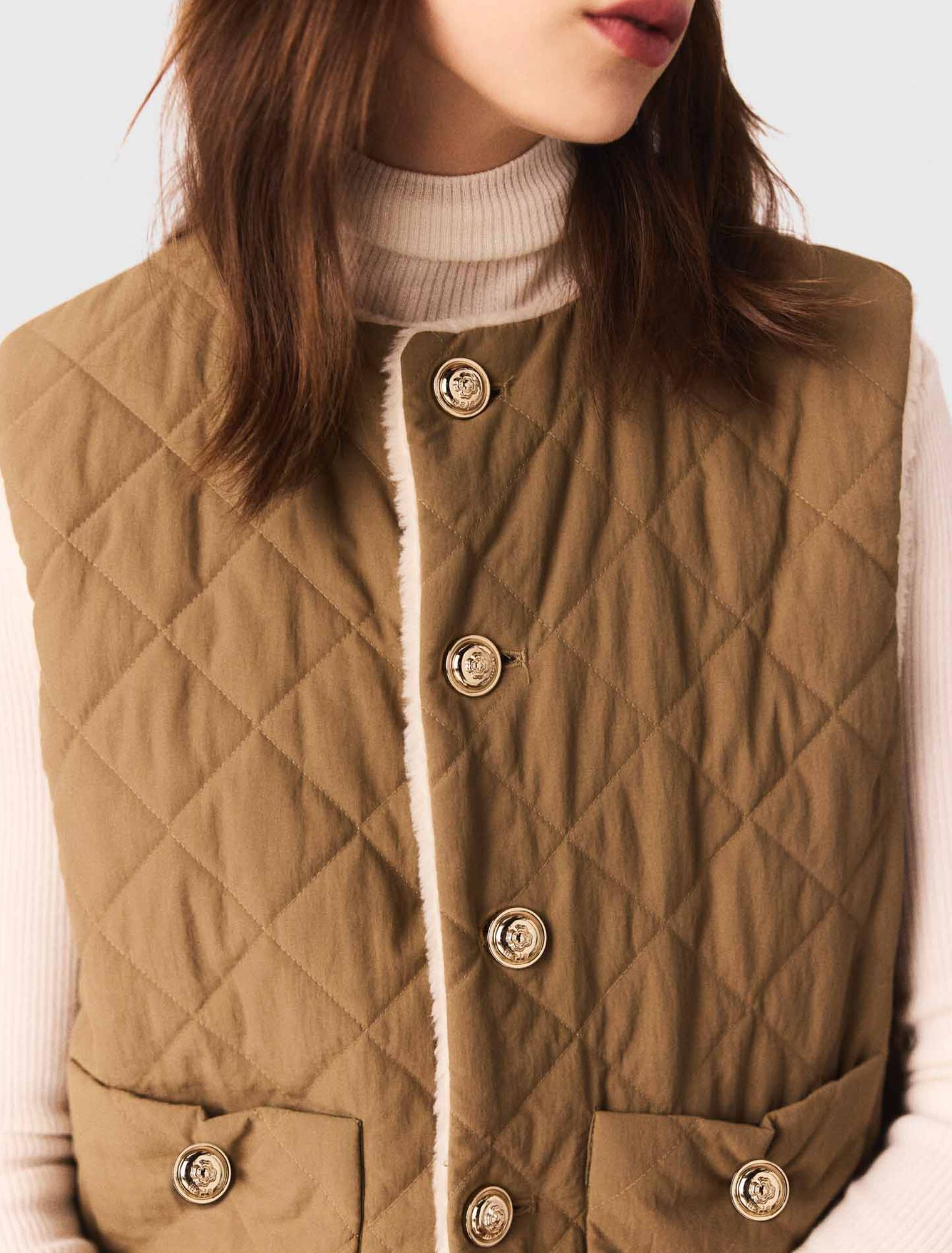 Short sleeveless puffer jacket Short sleeveless puffer jacket