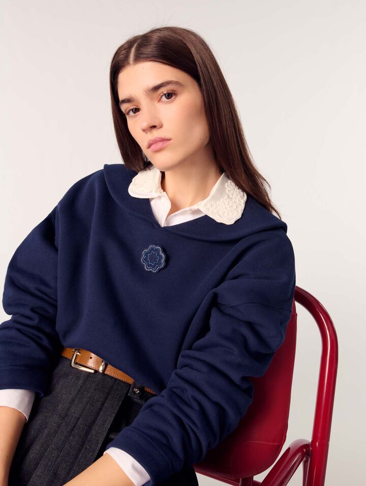 Short sweater with embroidery