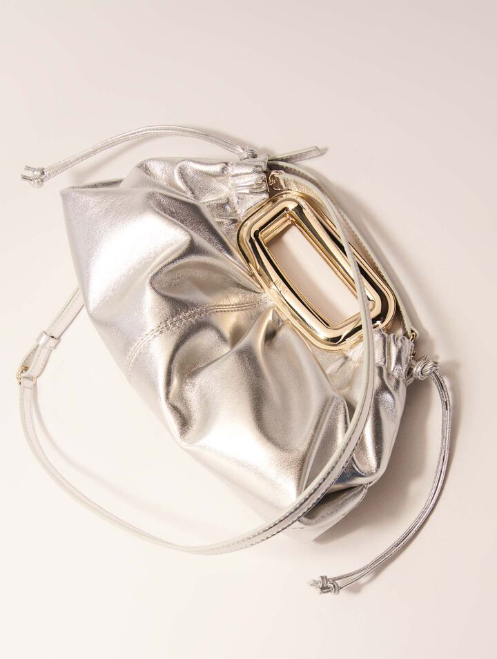Leather metal handle clutch