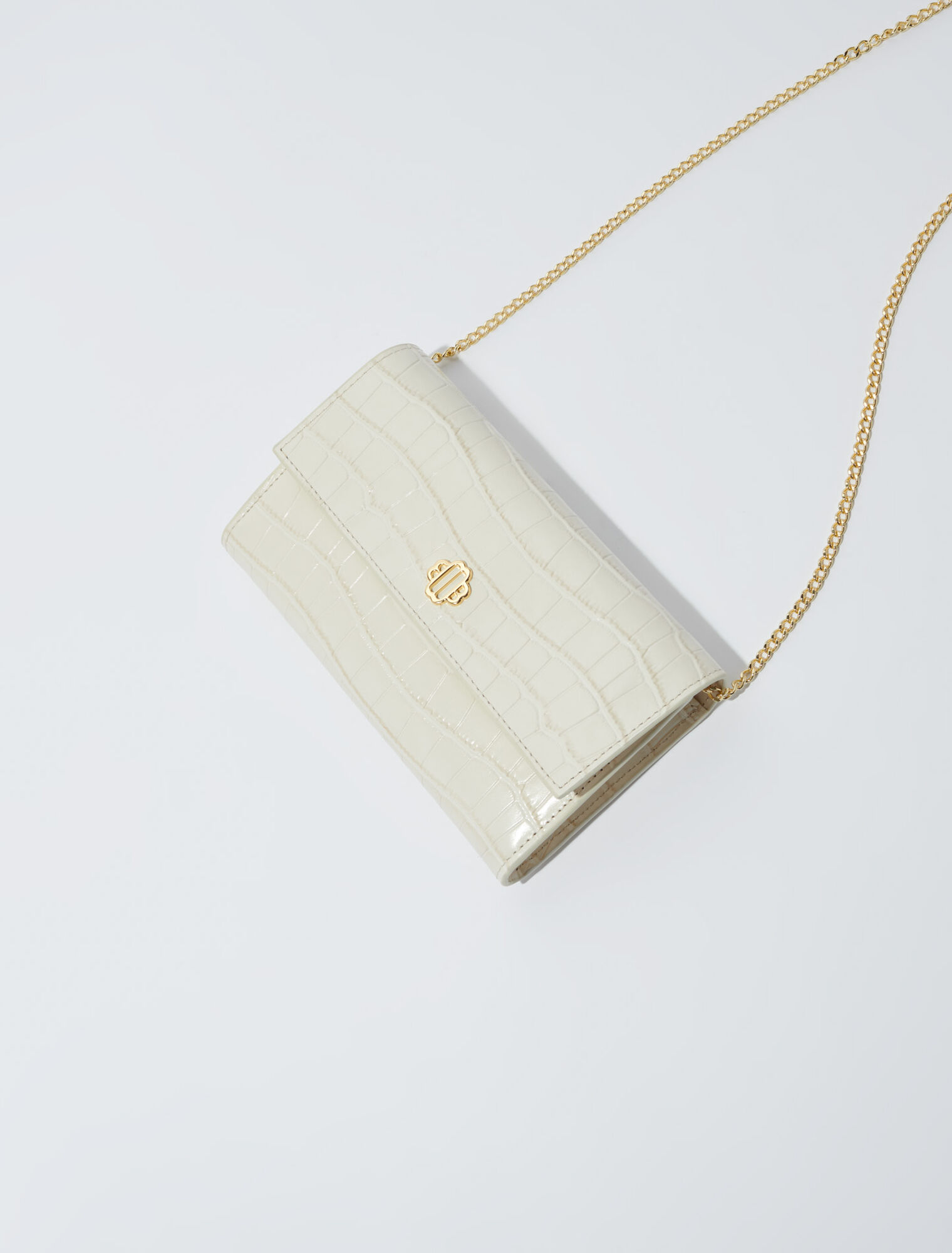 Croc-effect embossed leather bag