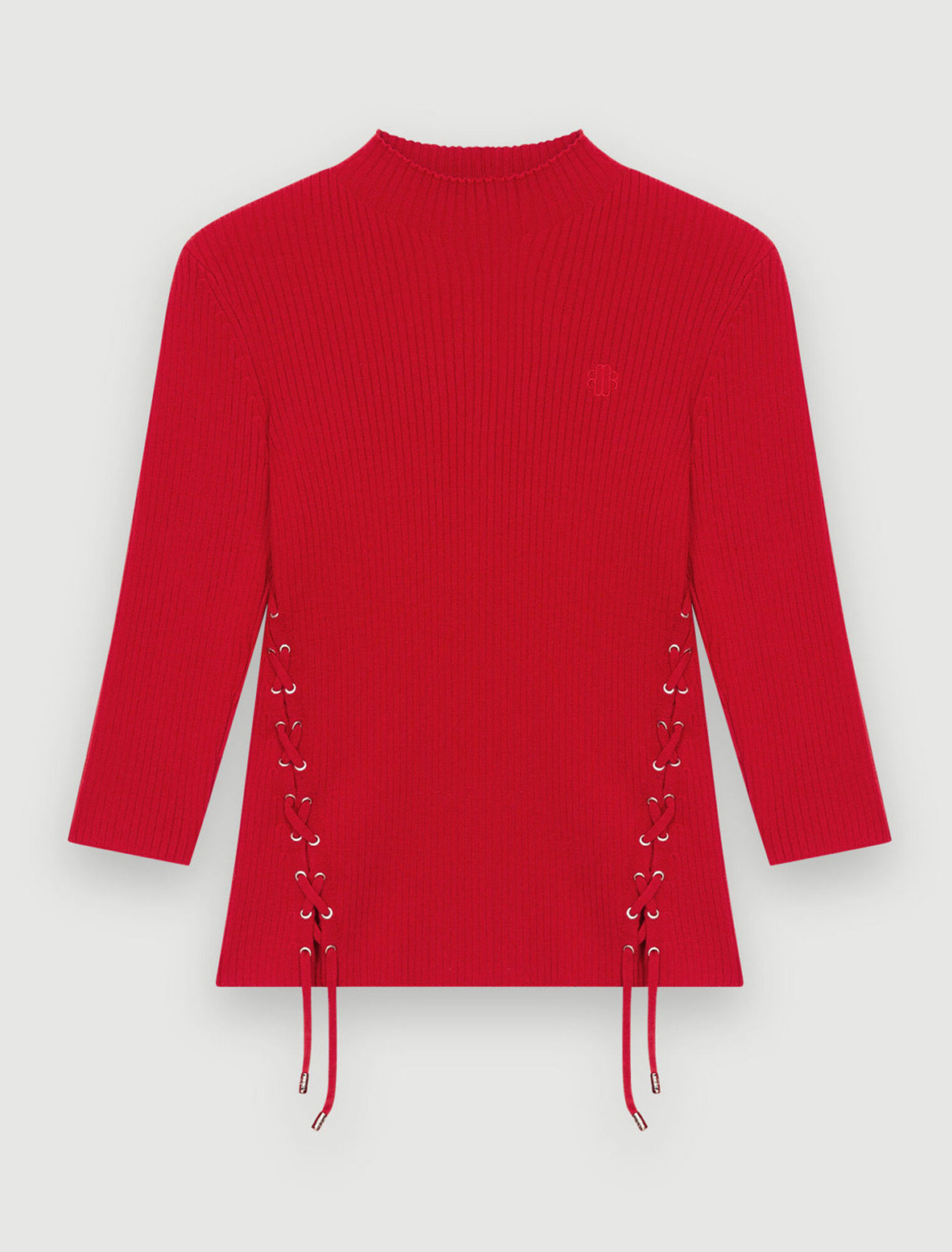 Sweater with silver eyelets