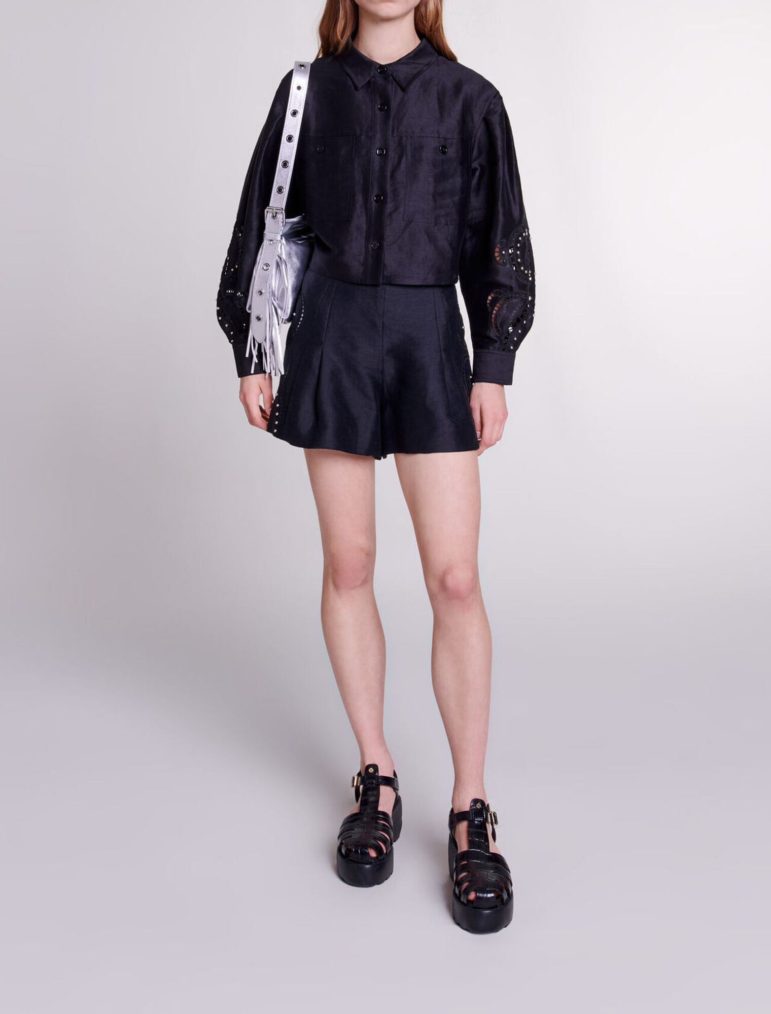 Openwork linen shorts with rivets