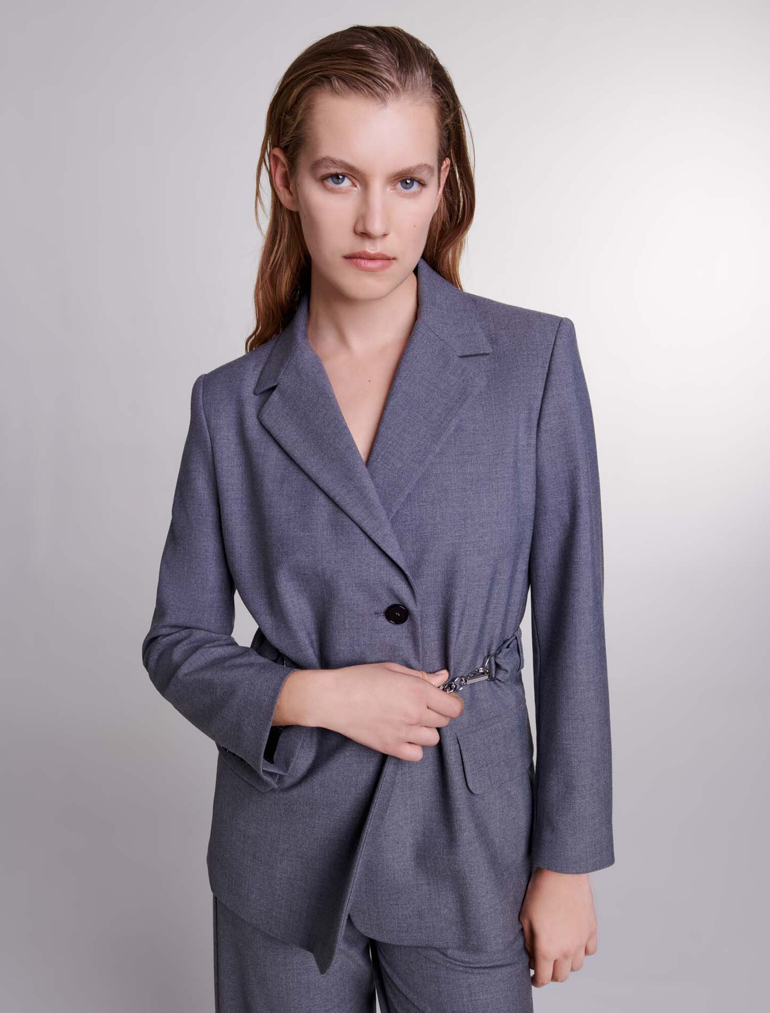 Suit jacket with chain belt