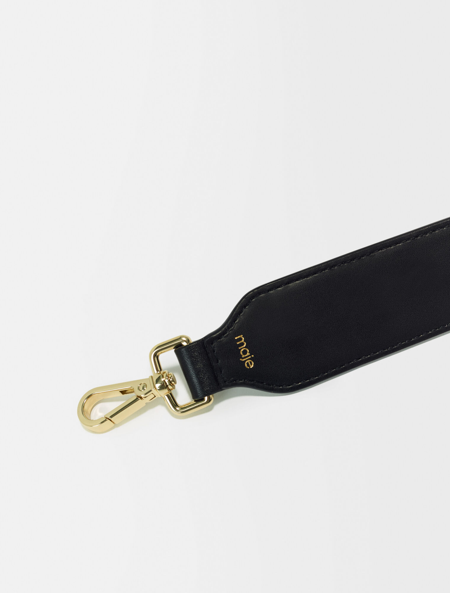 Studded leather shoulder strap
