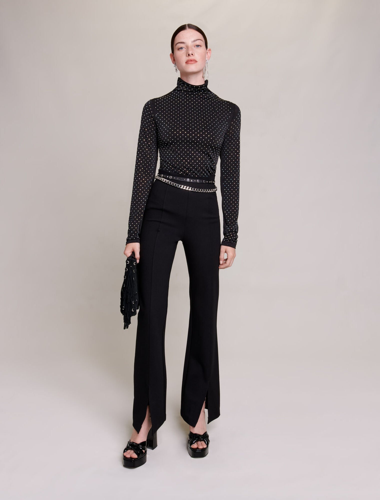 Black slim-fit trousers with slits
