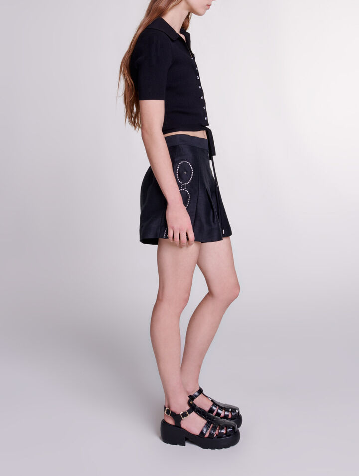 Openwork linen shorts with rivets