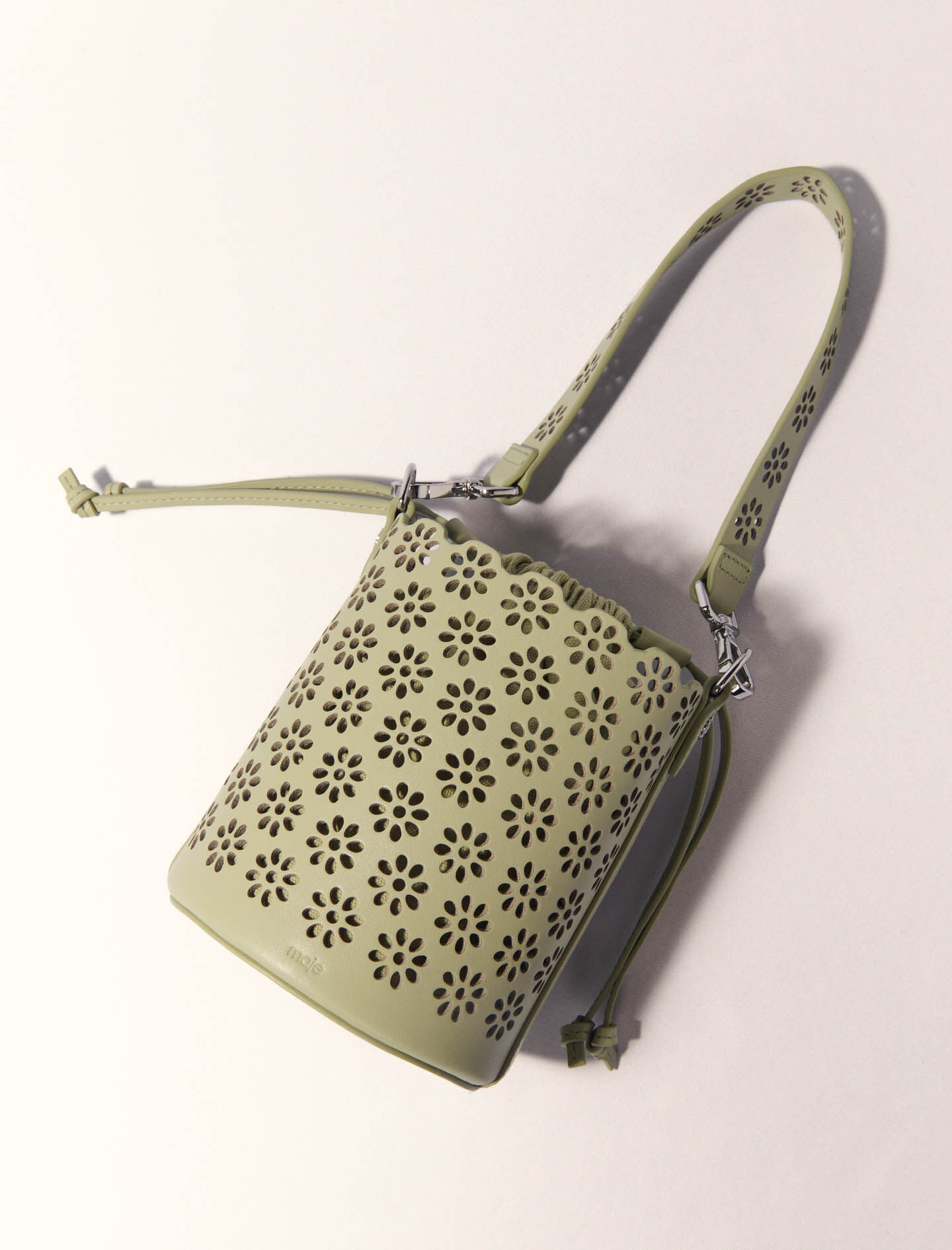 Perforated leather bucket bag Green For Women | Maje