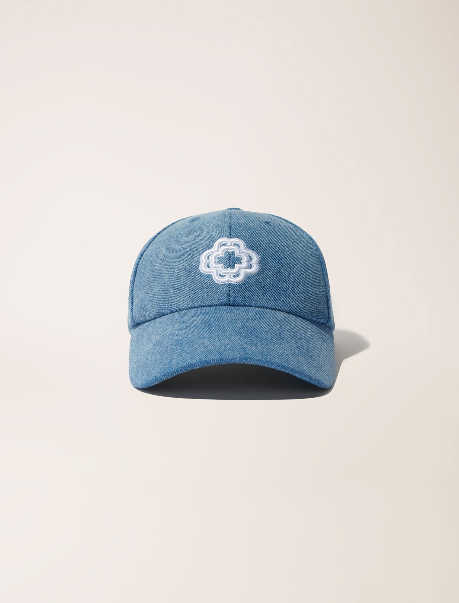 Denim cap with clover logo