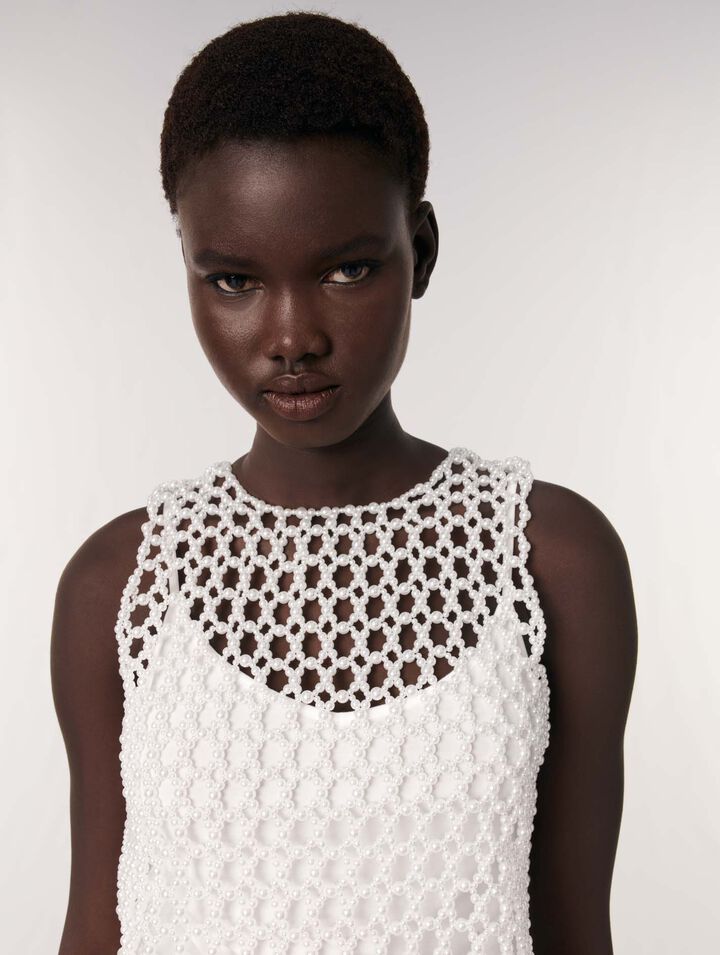 Cropped sleeveless beaded top