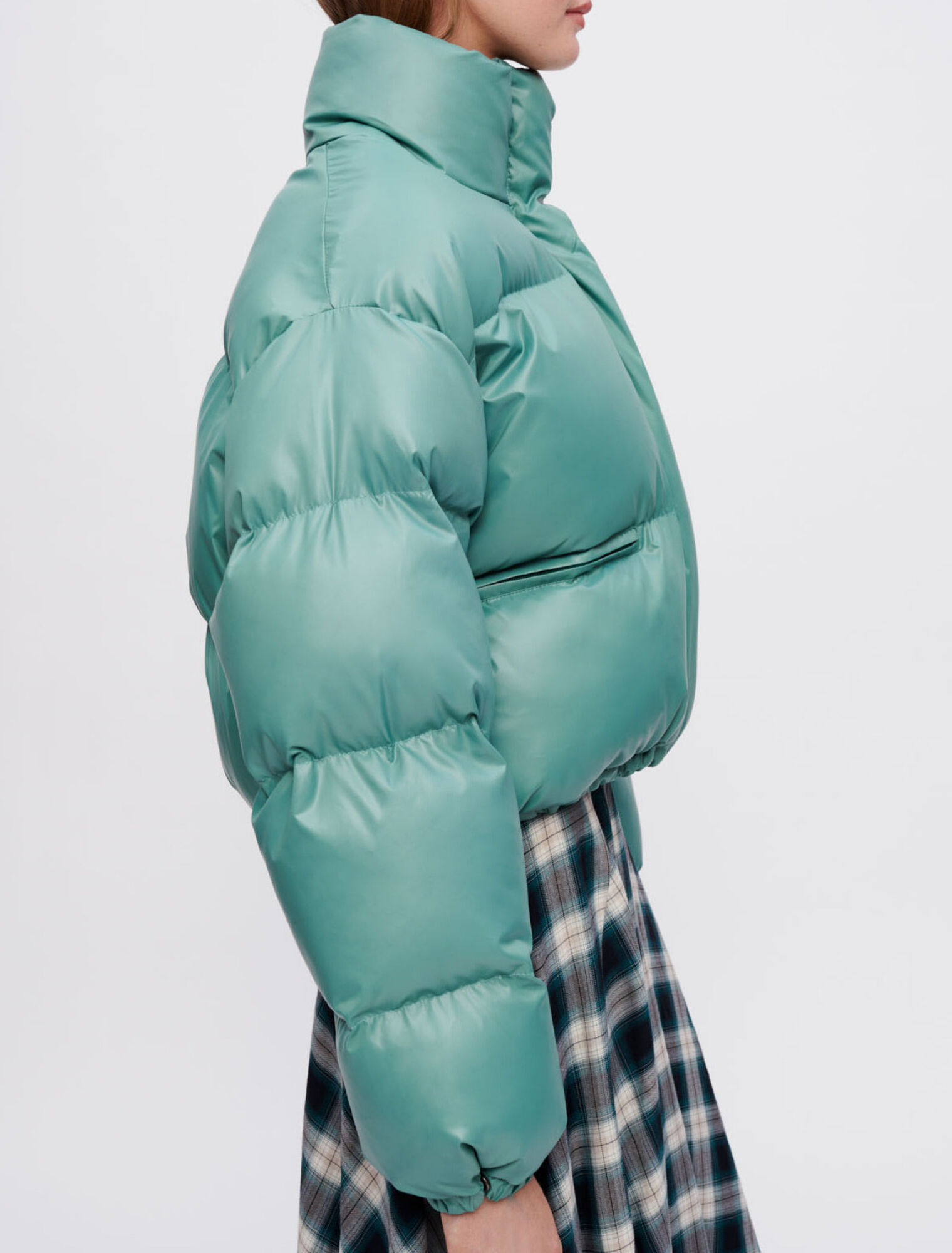 Green down jacket with Maje Clover patch