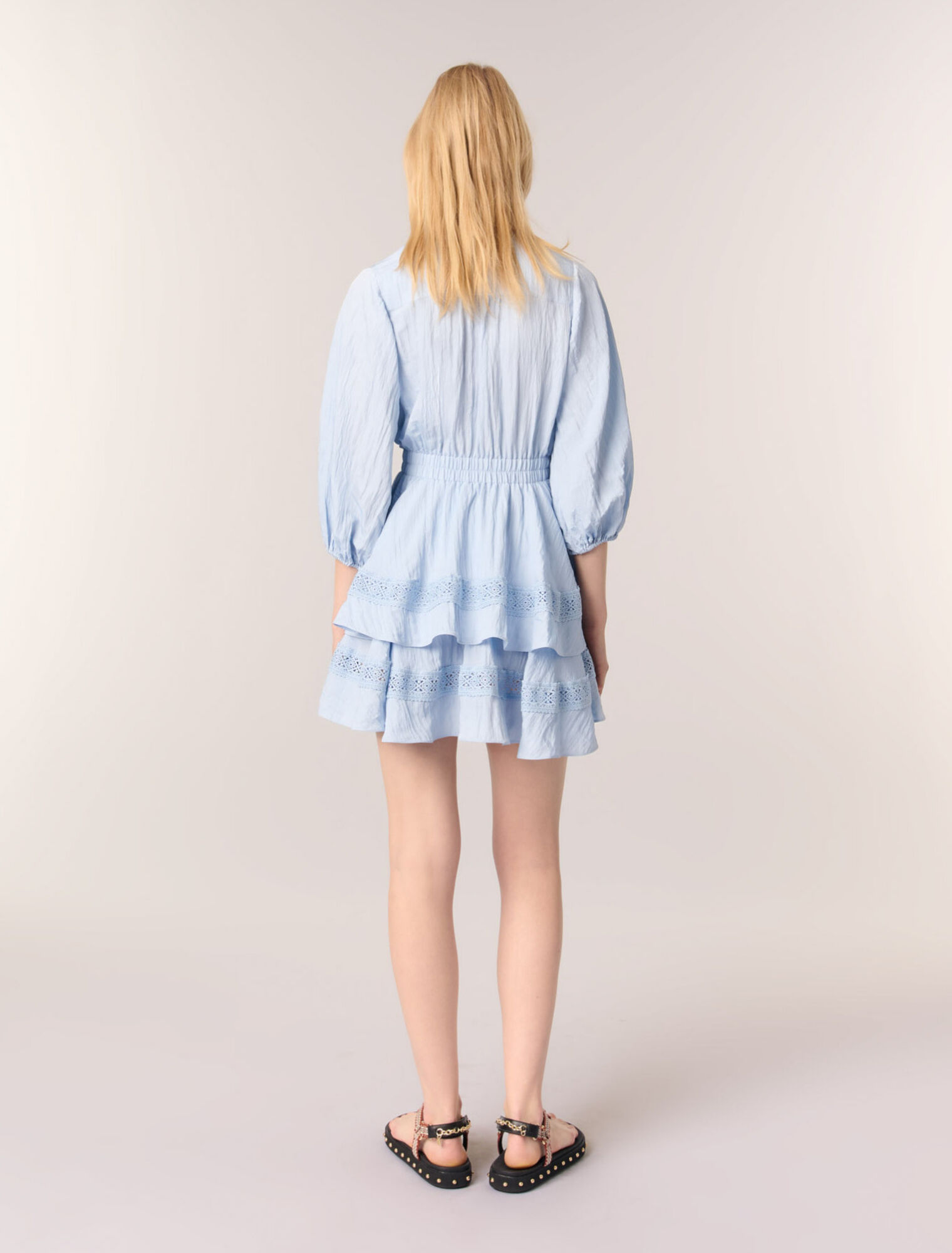 Dress with ruffles and lace details