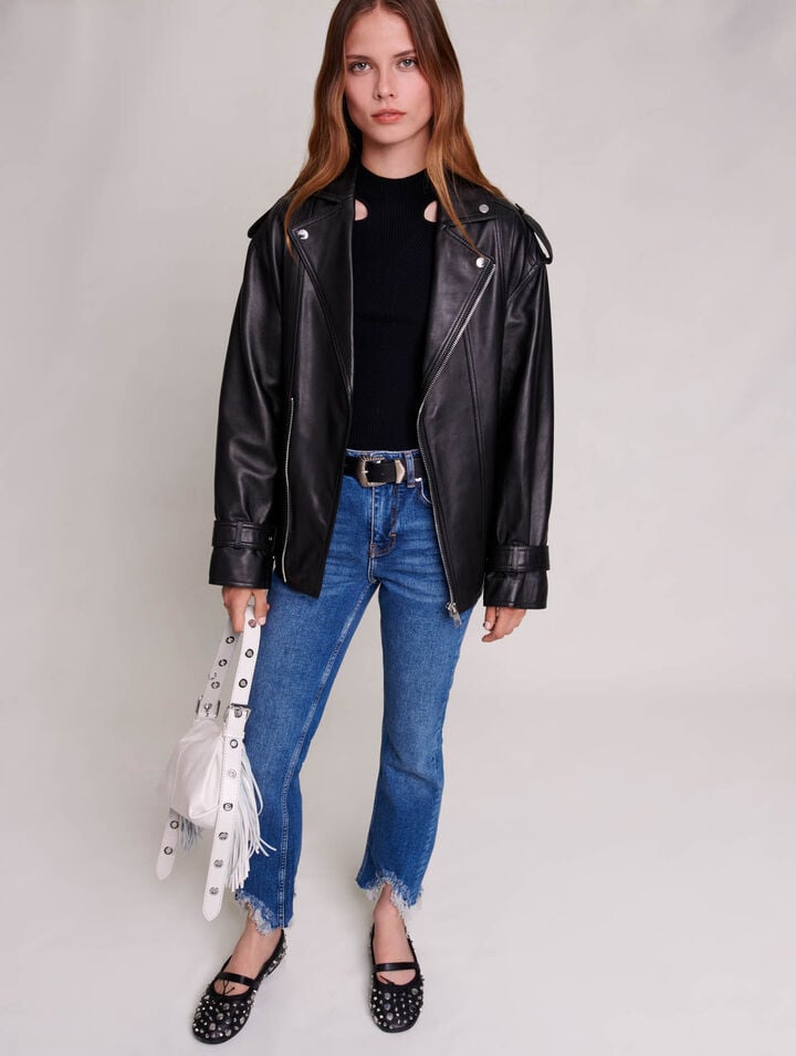 Slim-fit jeans, ripped at the bottom