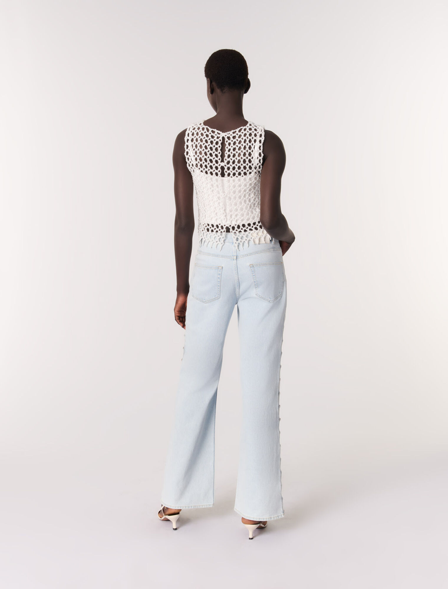 Cropped sleeveless beaded top