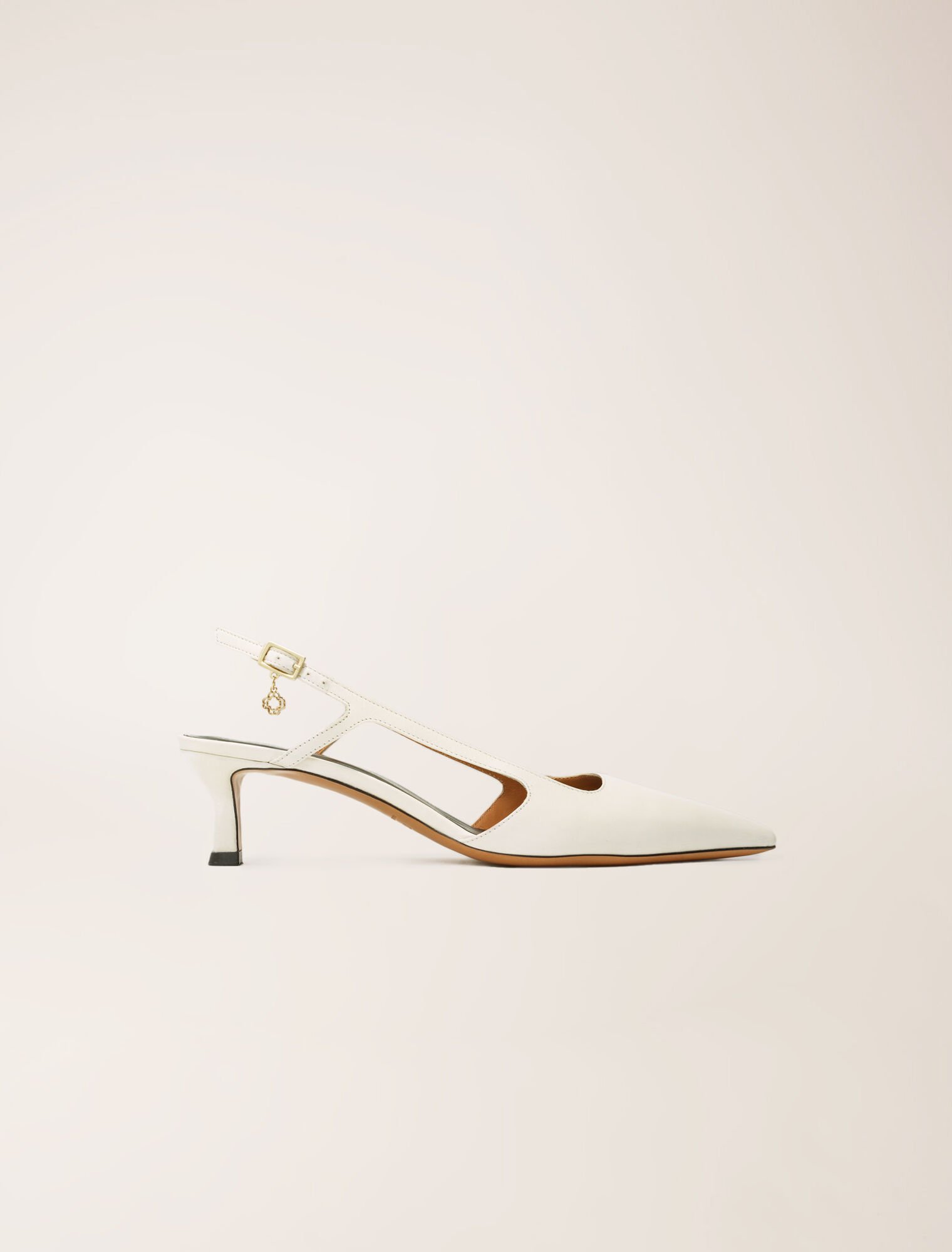 Pointed-toe pumps with straps