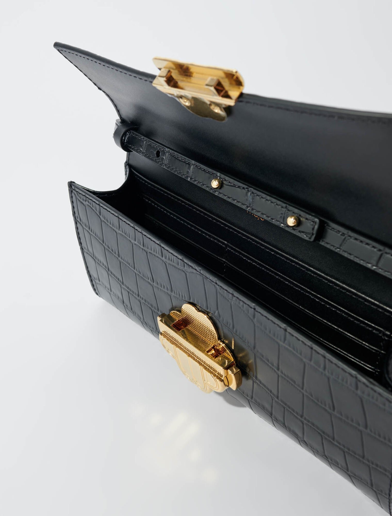 Croc-effect embossed leather bag