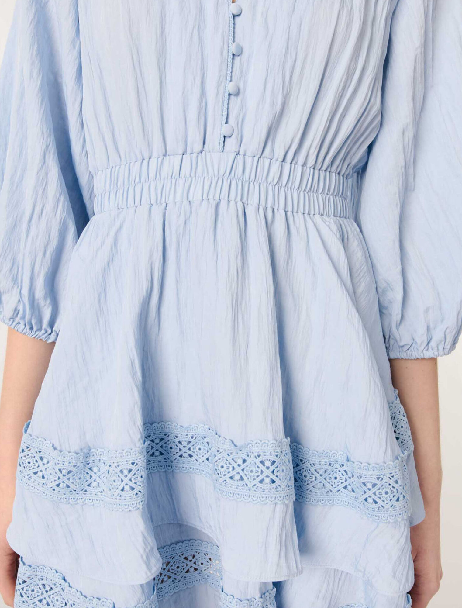 Dress with ruffles and lace details