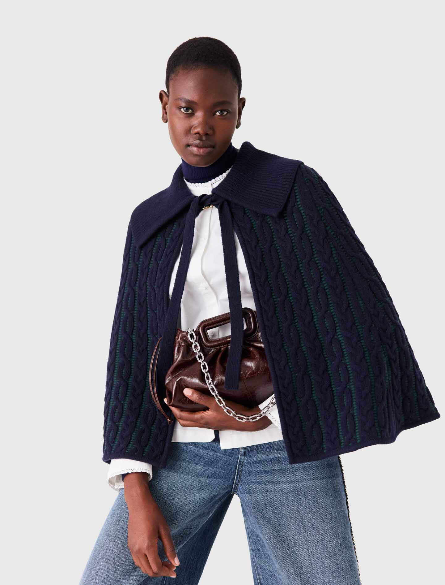 Faux sheepskin and vinyl coat
