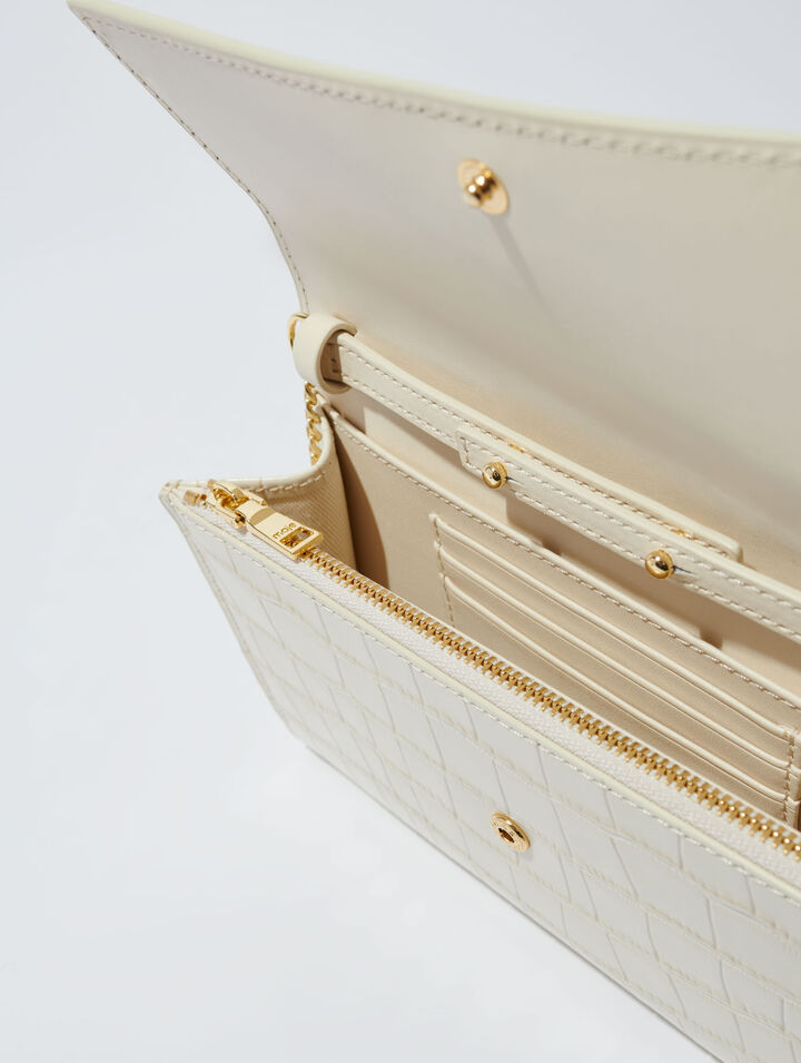 Croc-effect embossed leather bag