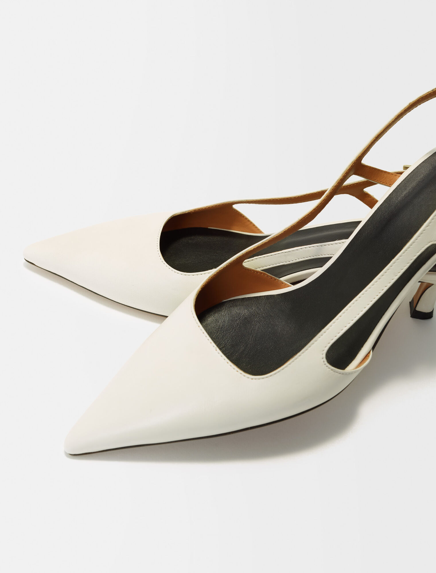 Pointed-toe pumps with straps
