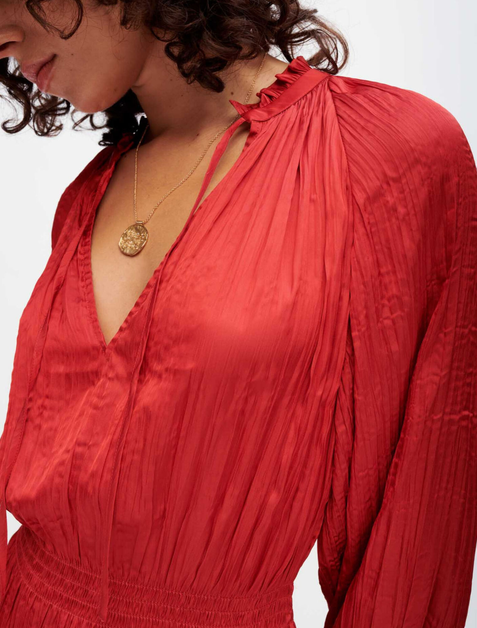 Fluid, pleated satin dress