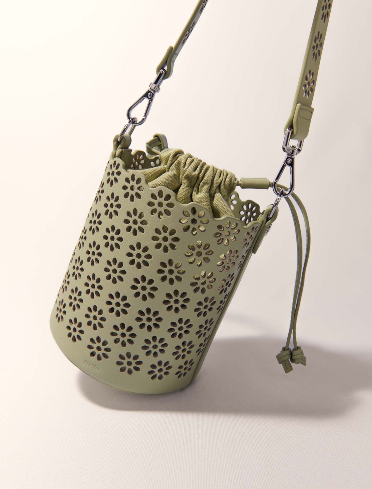 Perforated leather bucket bag Green For Women | Maje