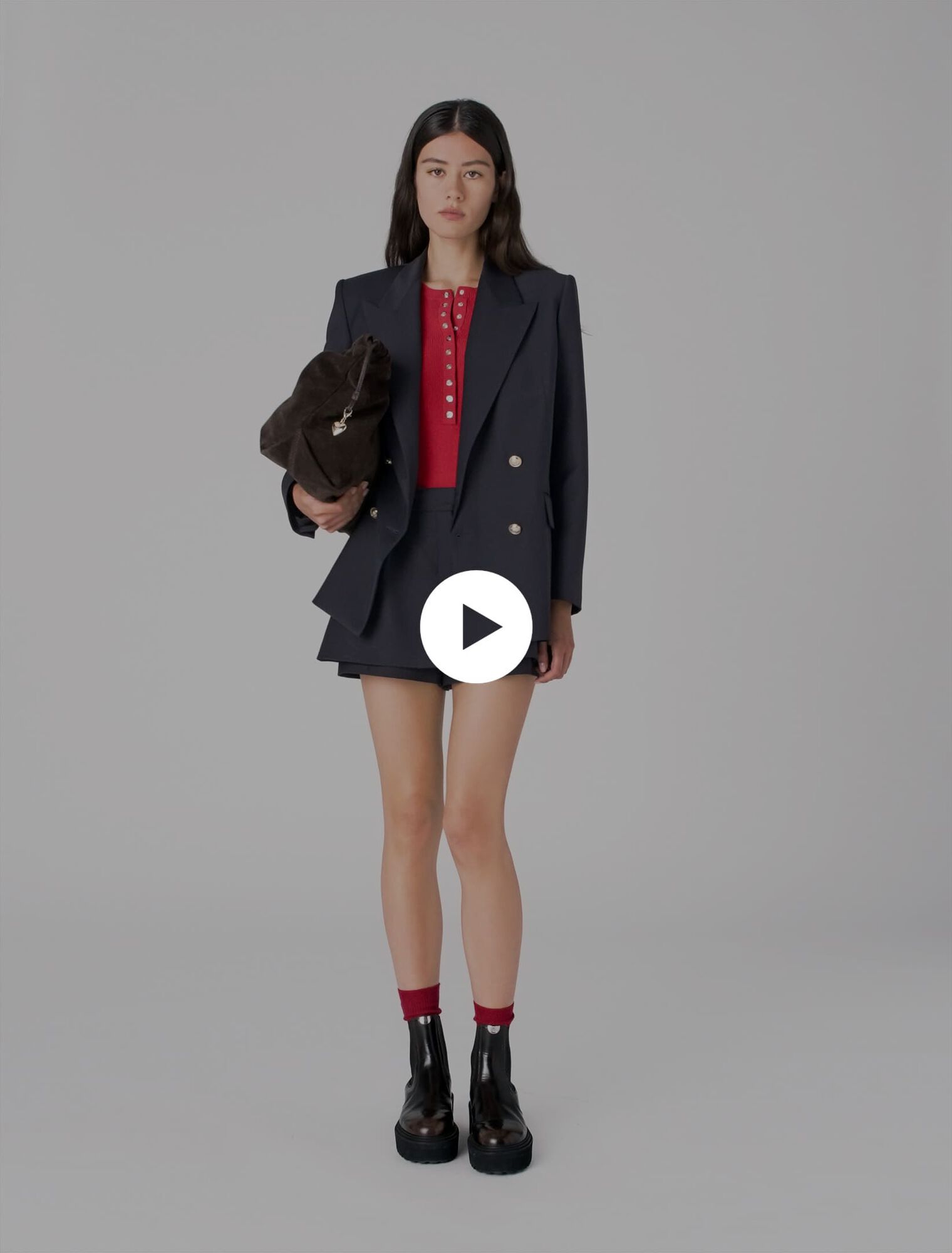 Suit jacket with gold buttons