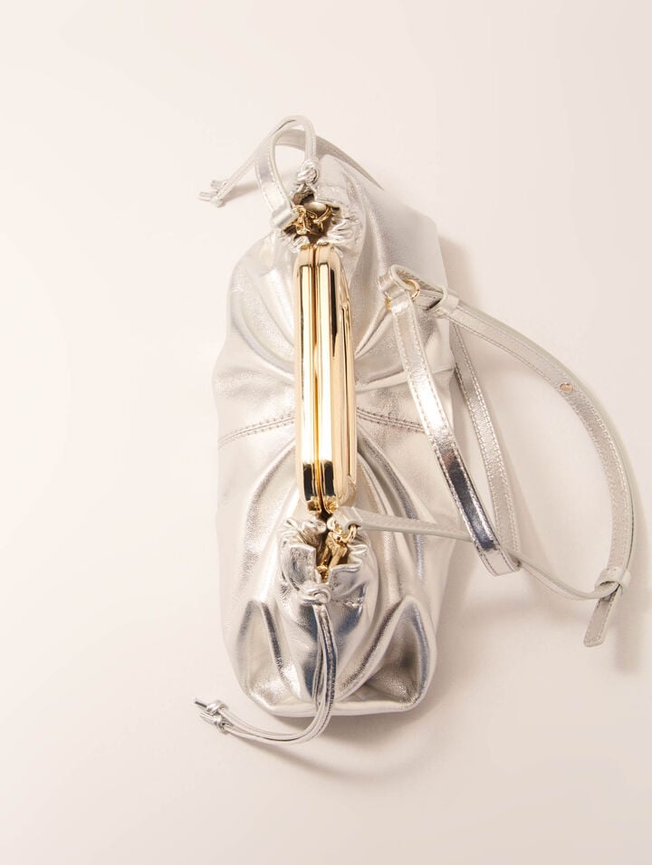 Leather metal handle clutch