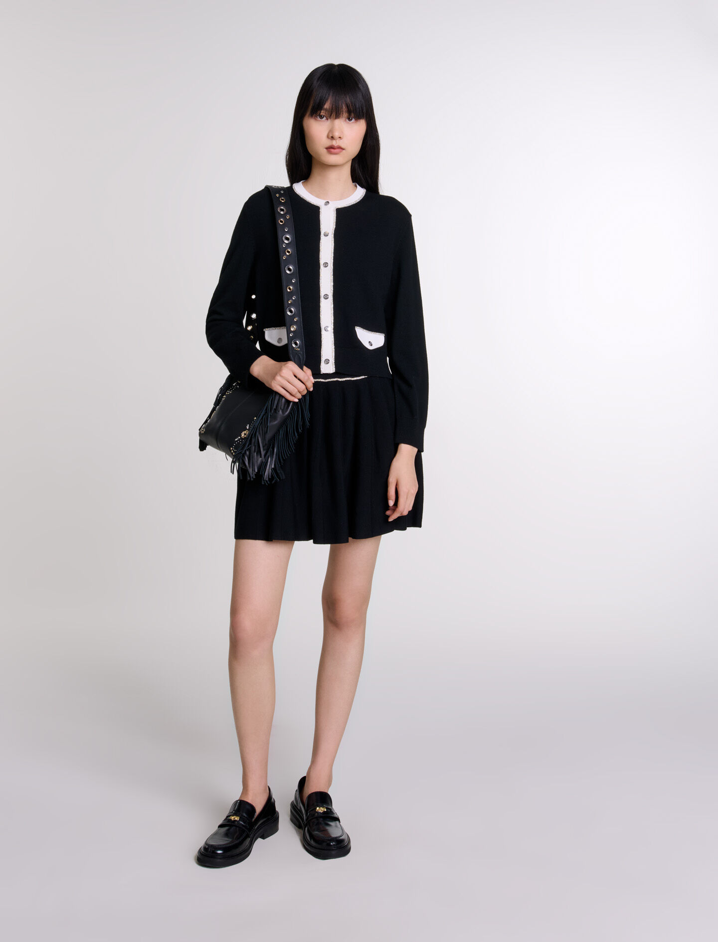 Leather shoulder strap with eyelets