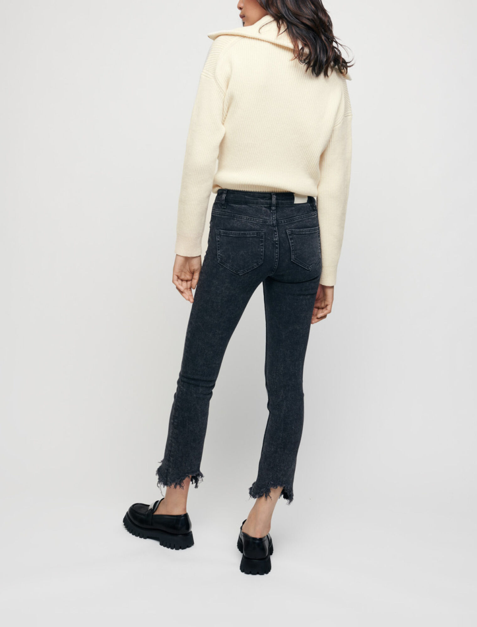 Straight jeans with ripped hems