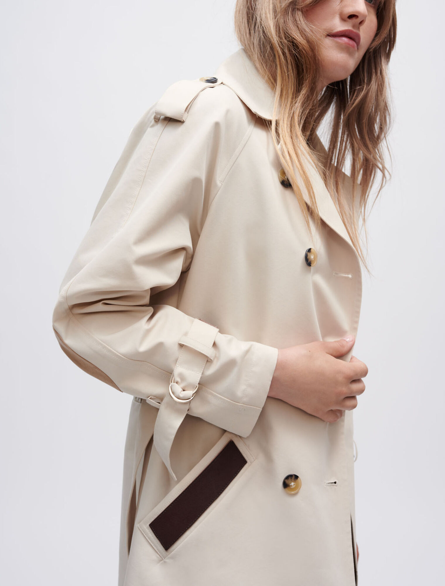 Trench coat with smocking at the back