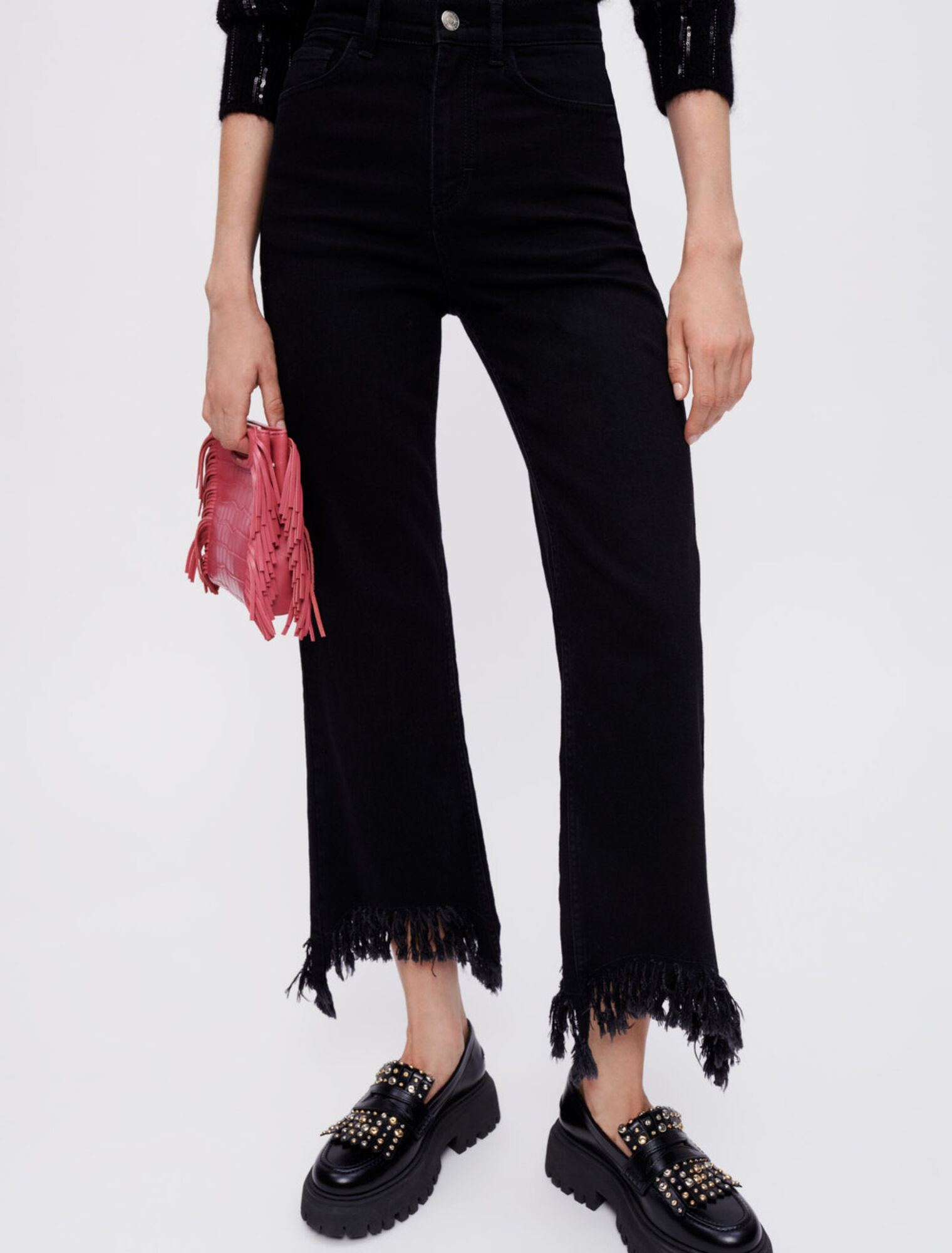Black high-waisted jeans ripped