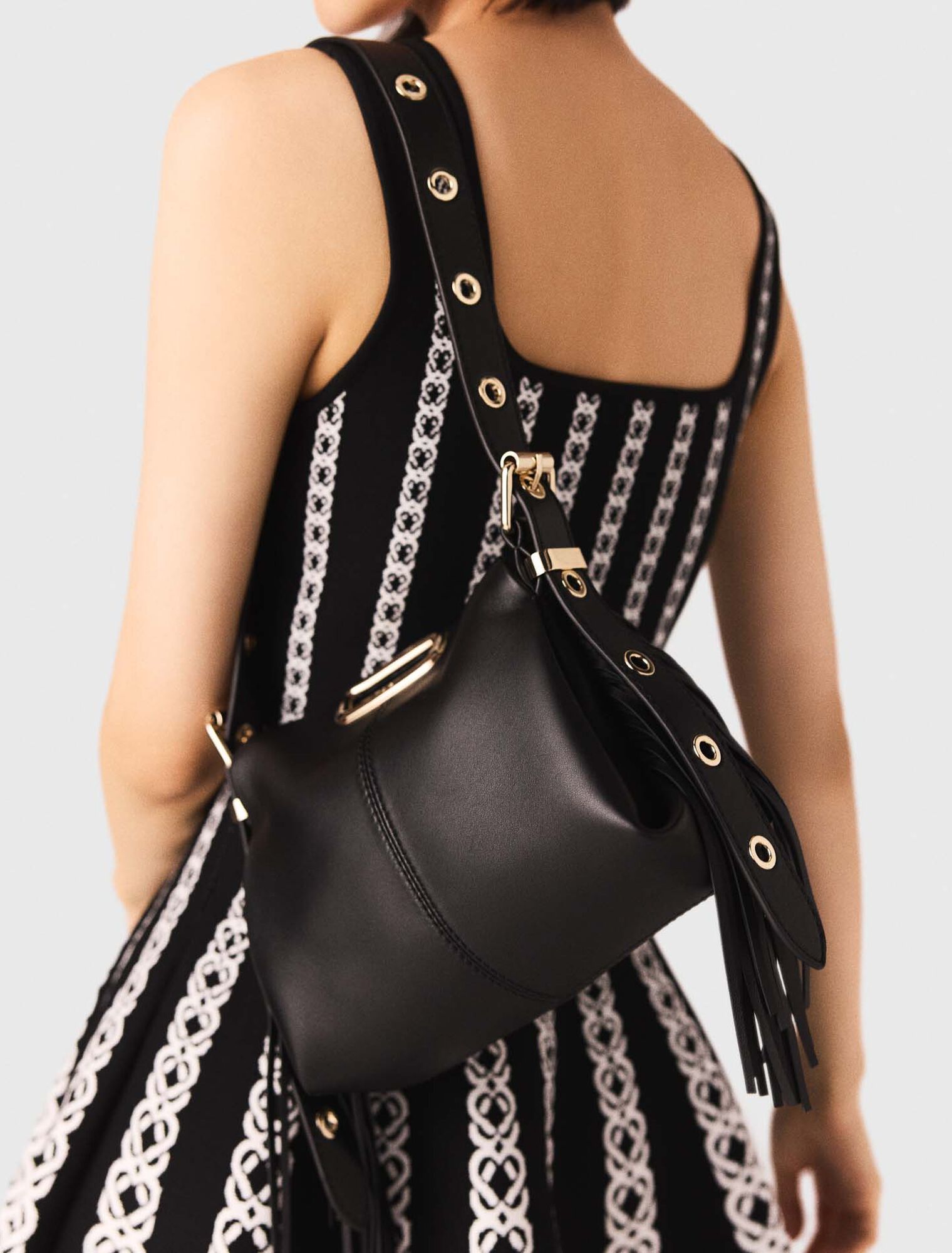 Gold handle Miss M Mini bag