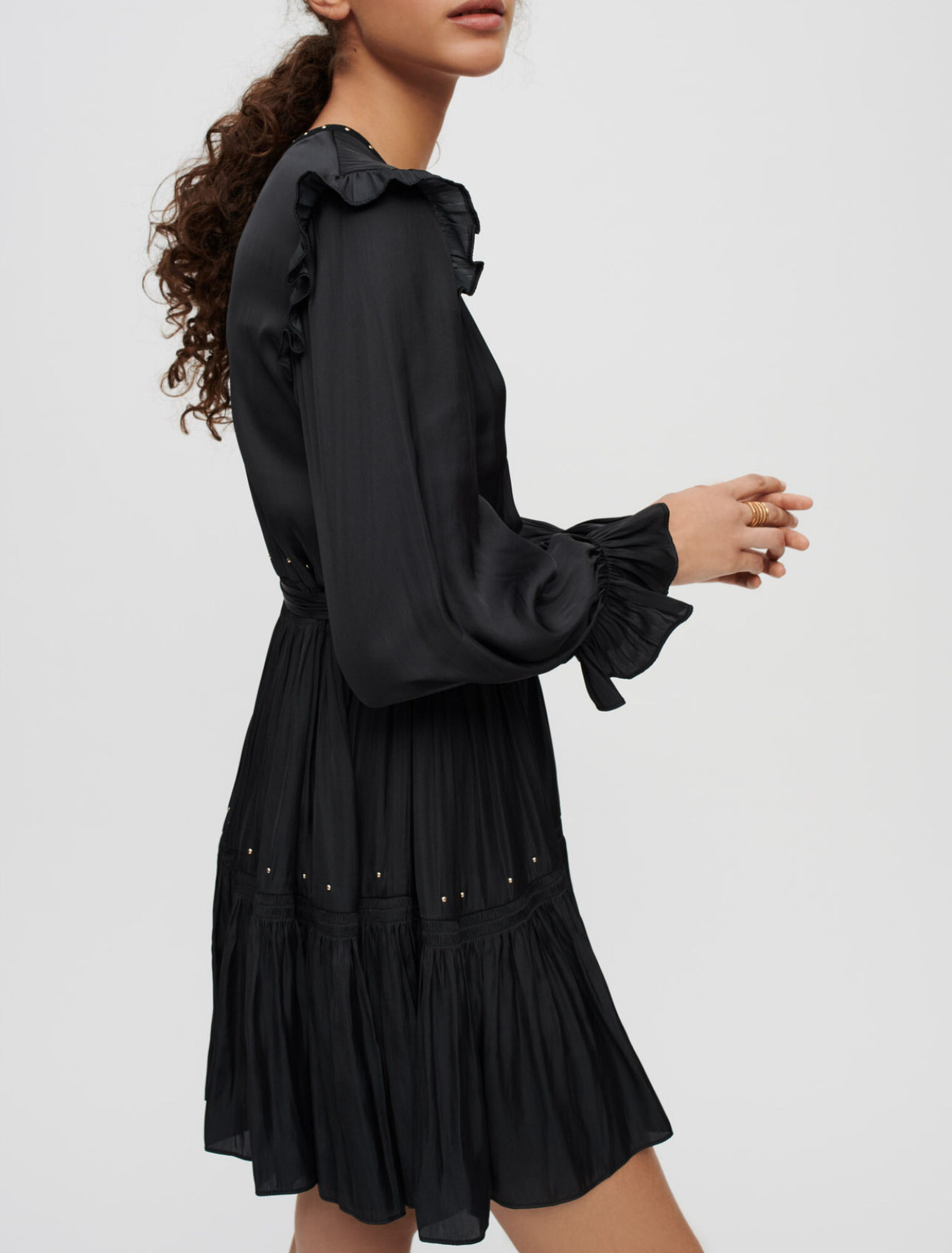 Black flowing satin dress, gold studs