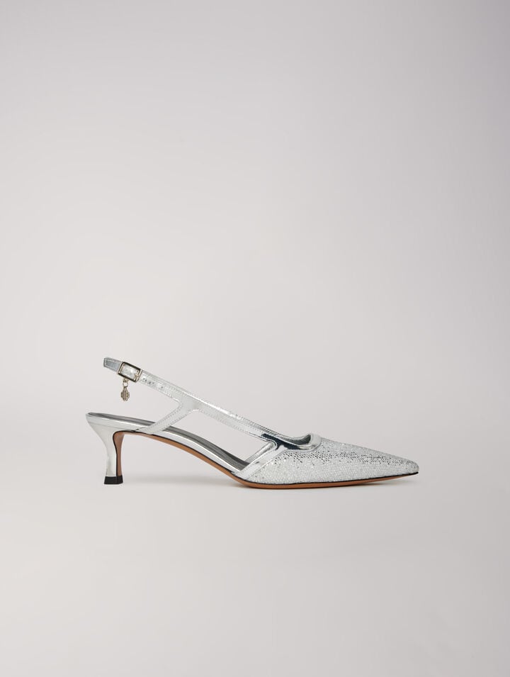 Pointed silver pumps