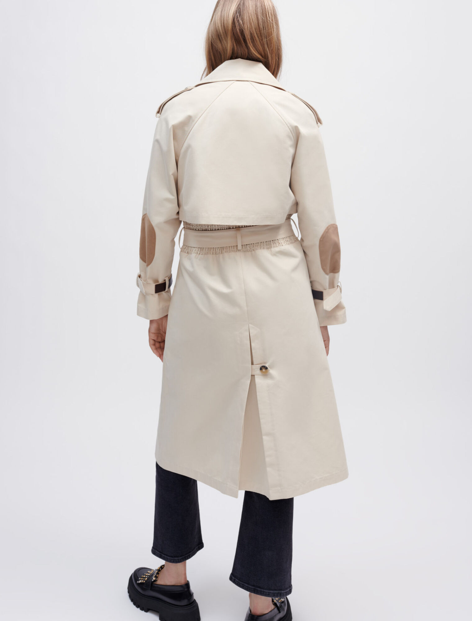 Trench coat with smocking at the back
