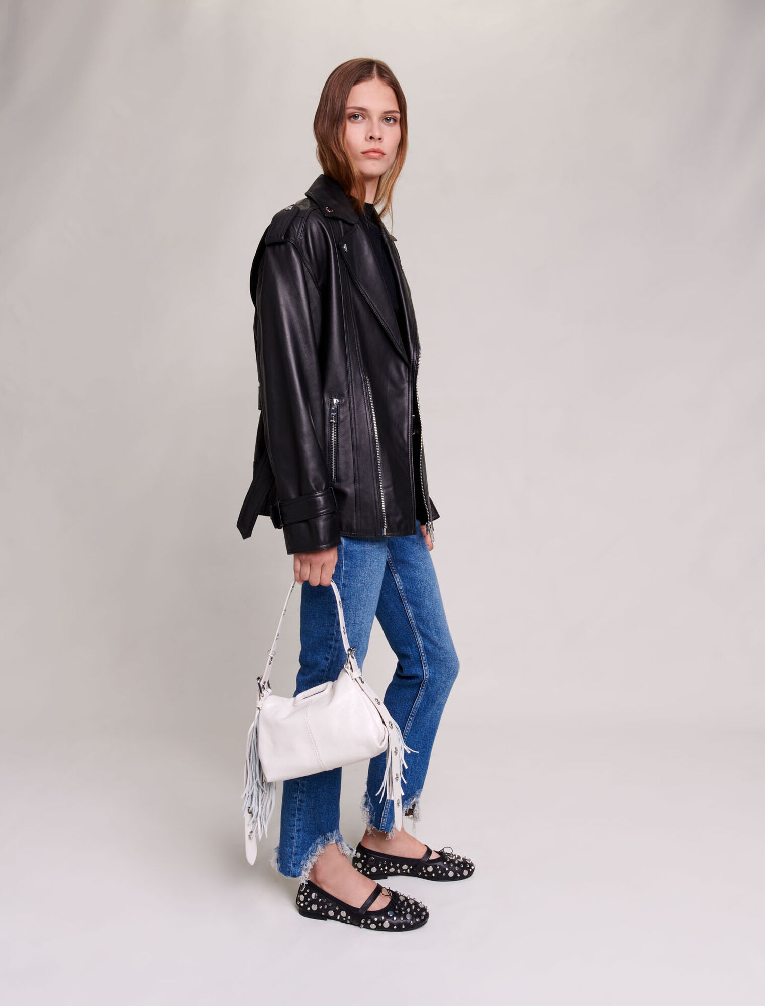 Slim-fit jeans, ripped at the bottom