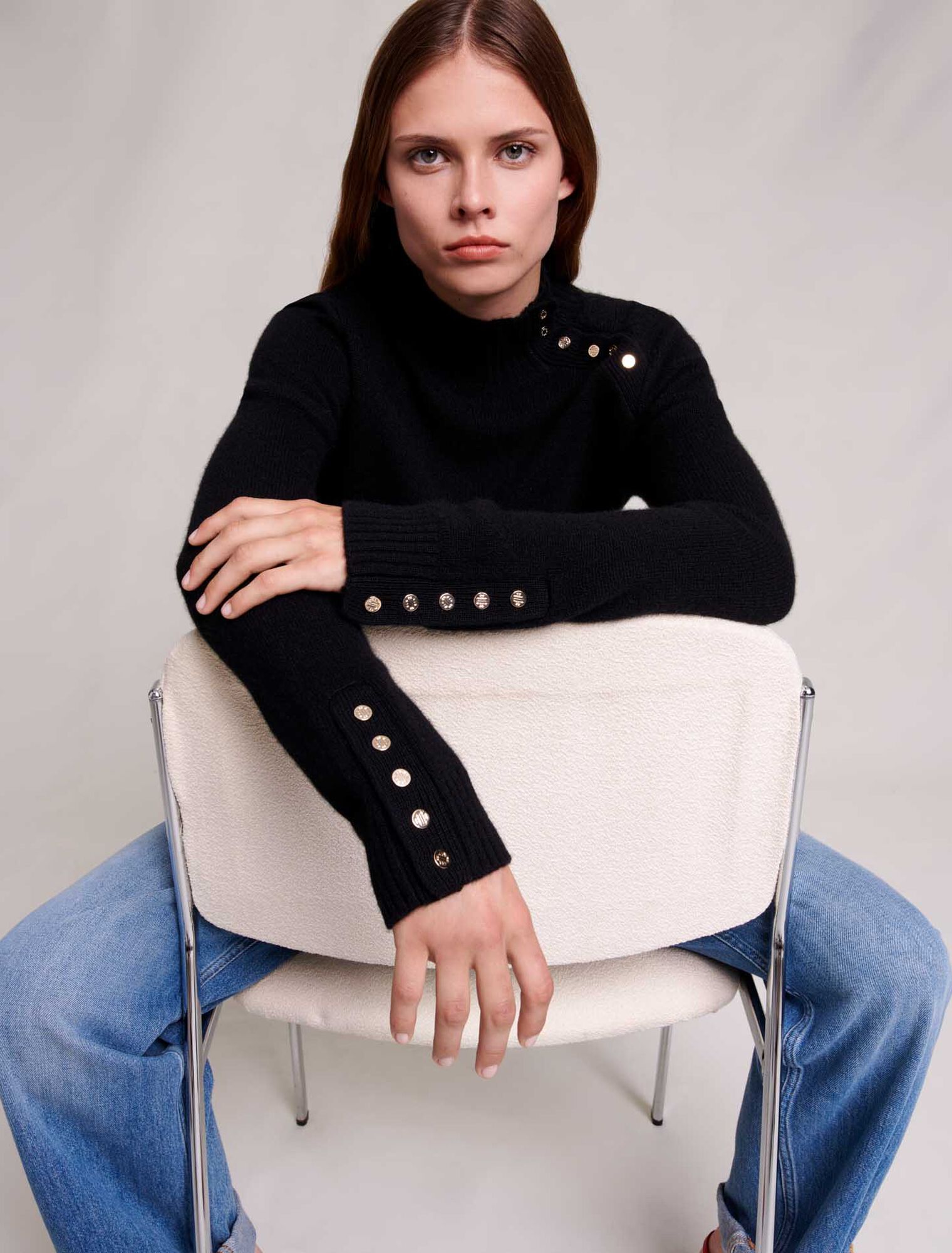 Cashmere sweater with gold snap buttons