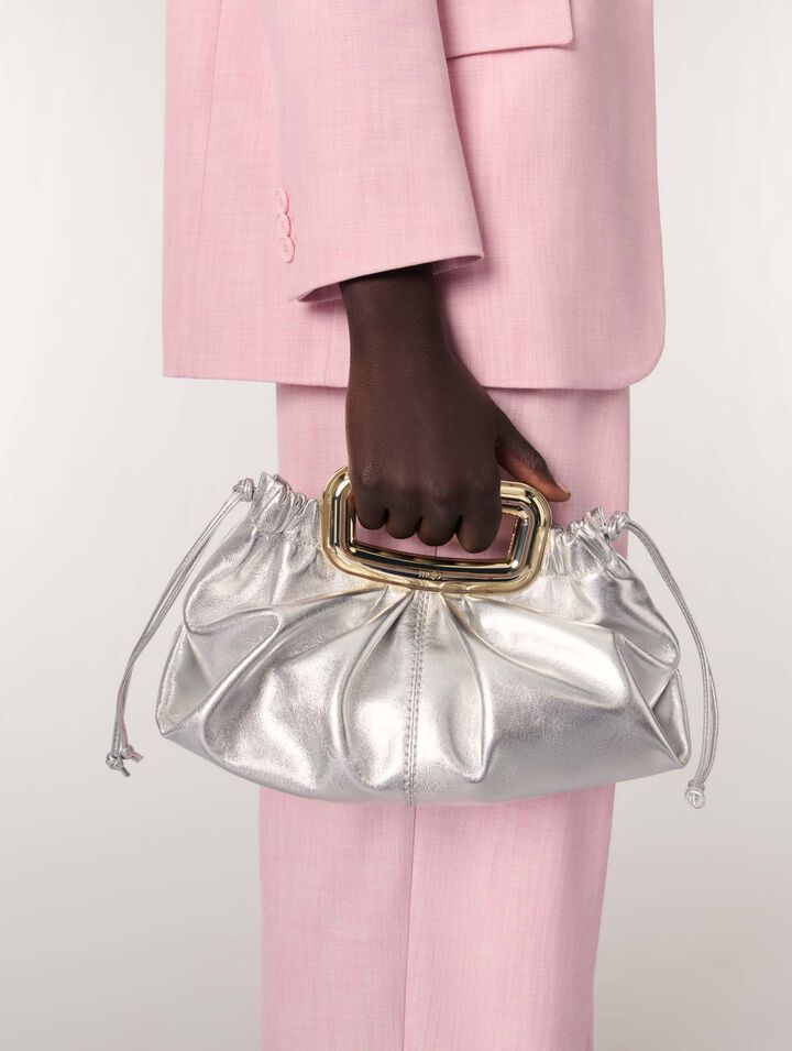 Leather metal handle clutch
