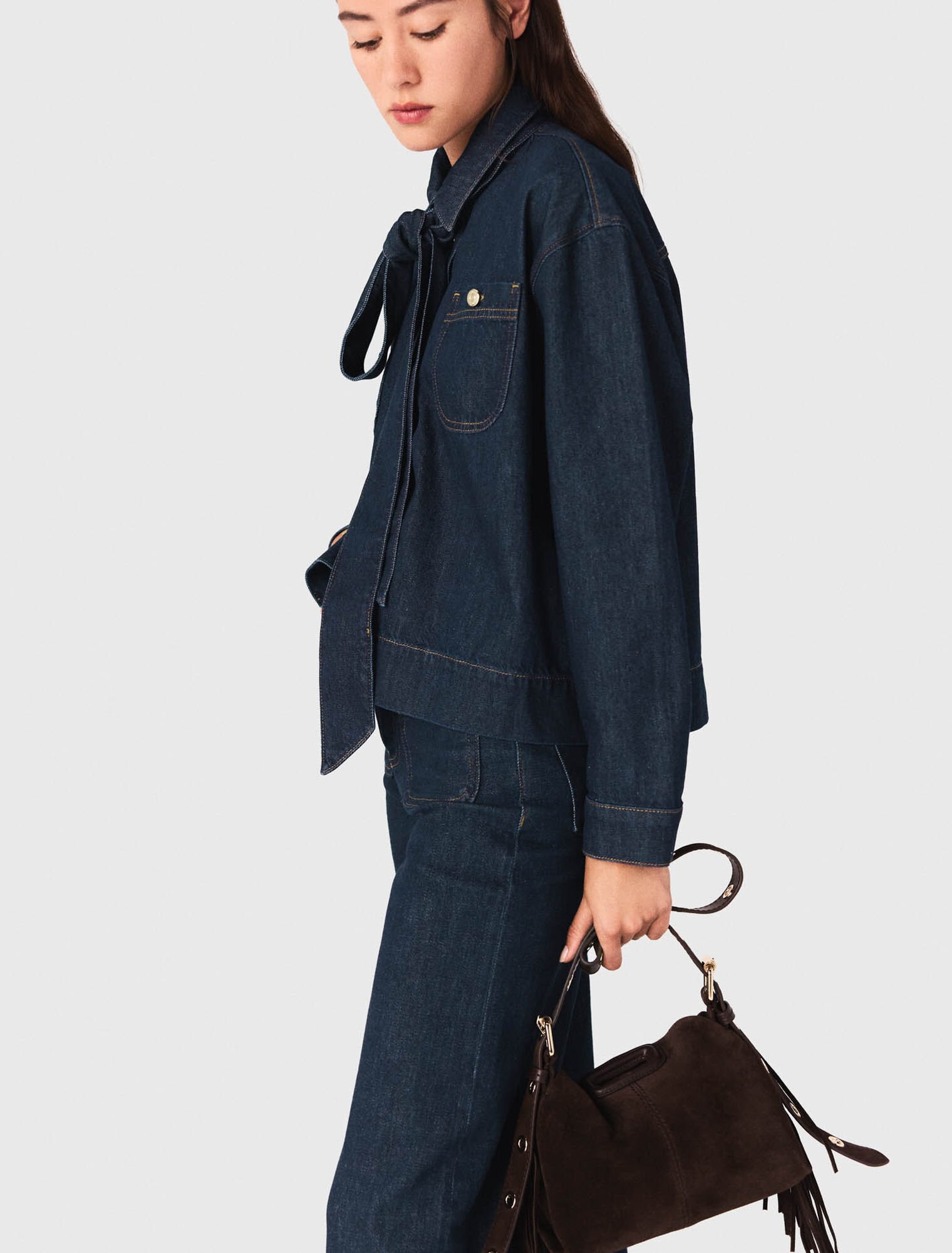 Denim jacket with bow
