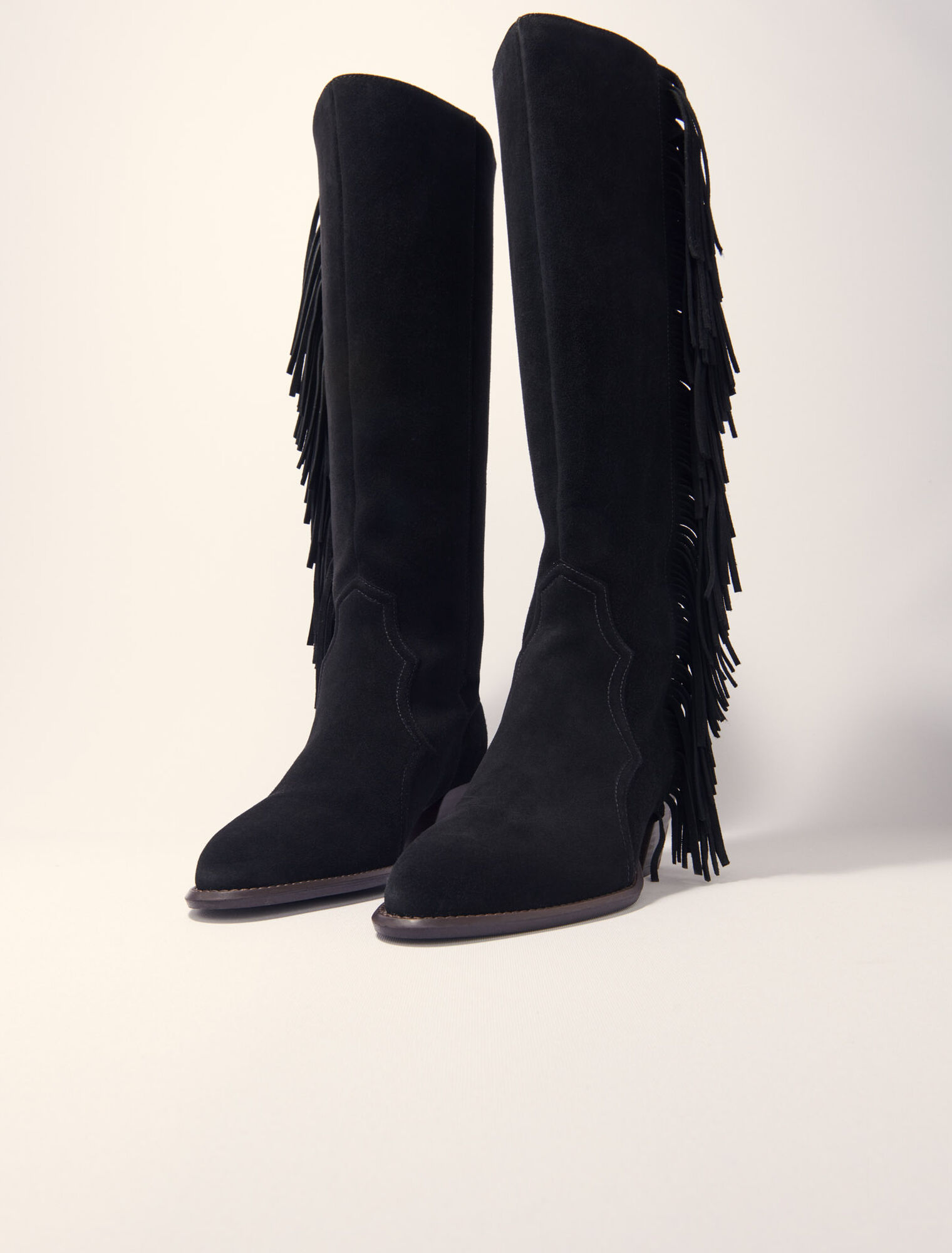 Fringed suede cowboy boots
