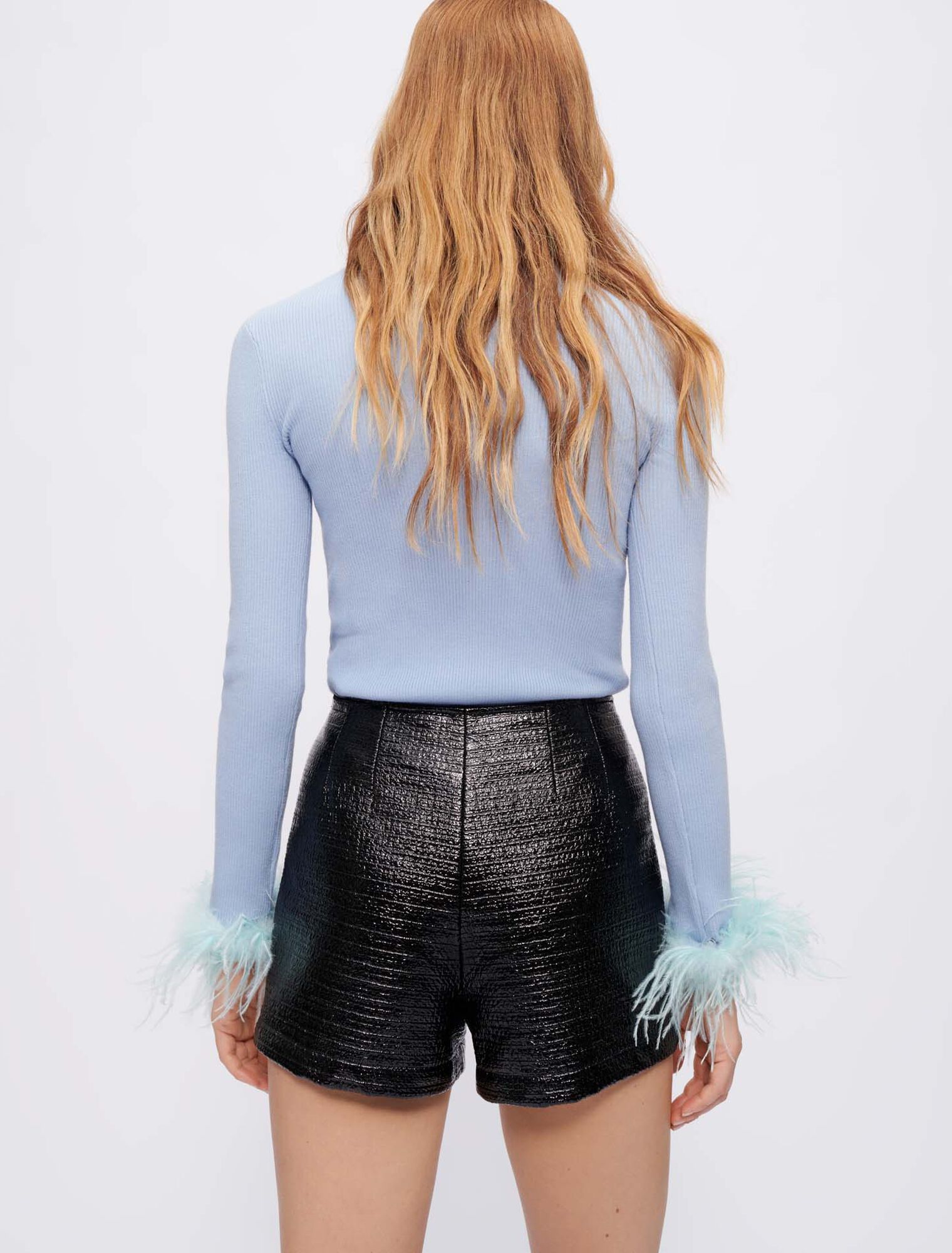 Turtleneck pullover with feathered cuffs