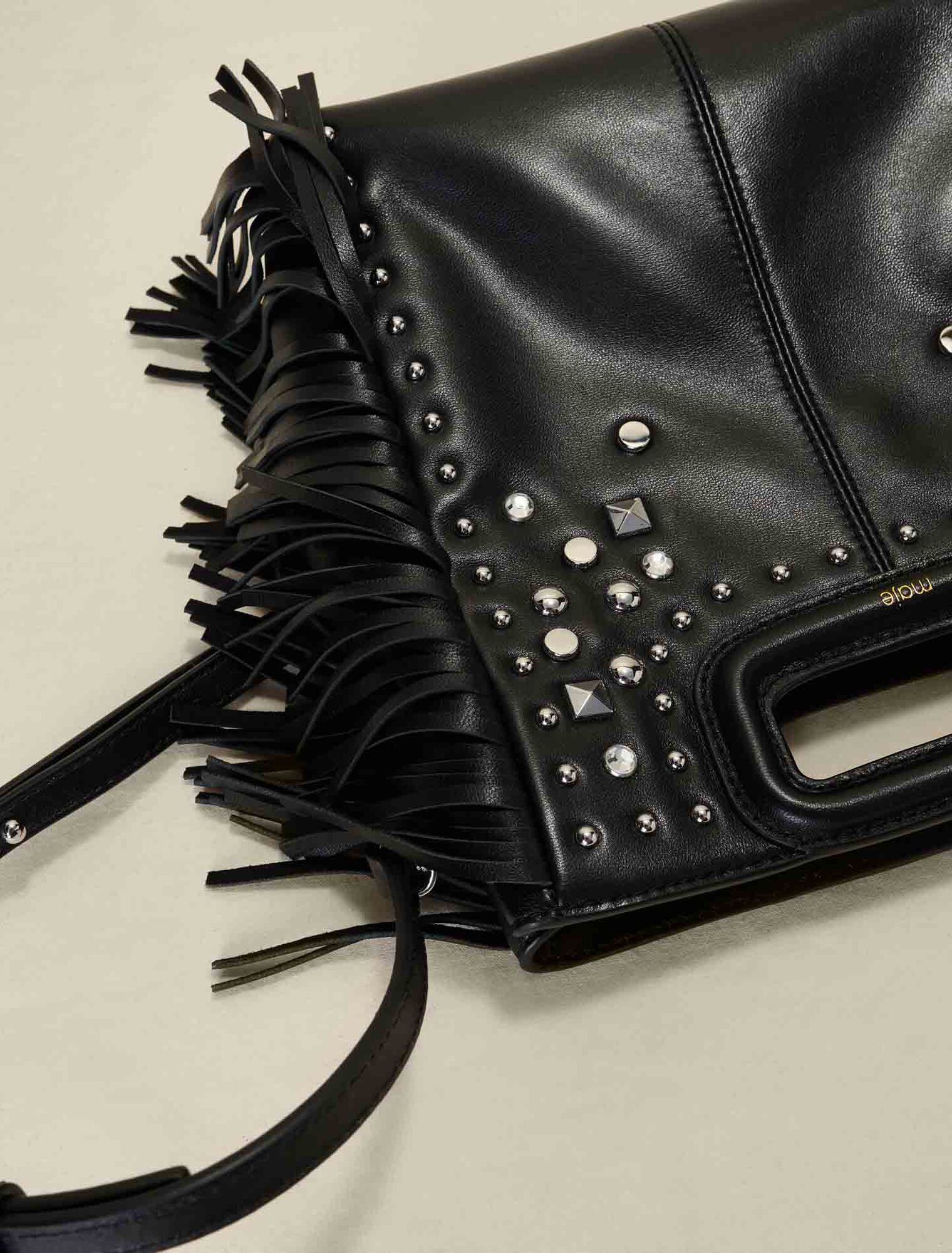 Studded leather M bag with fringing