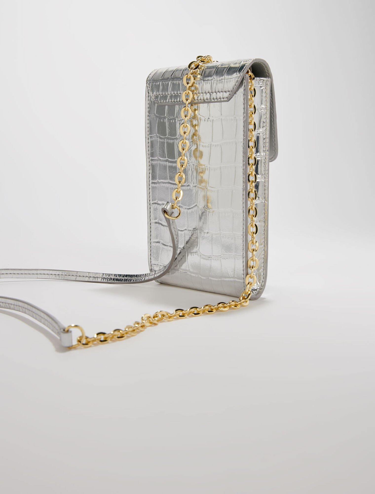 Metallic embossed leather clutch