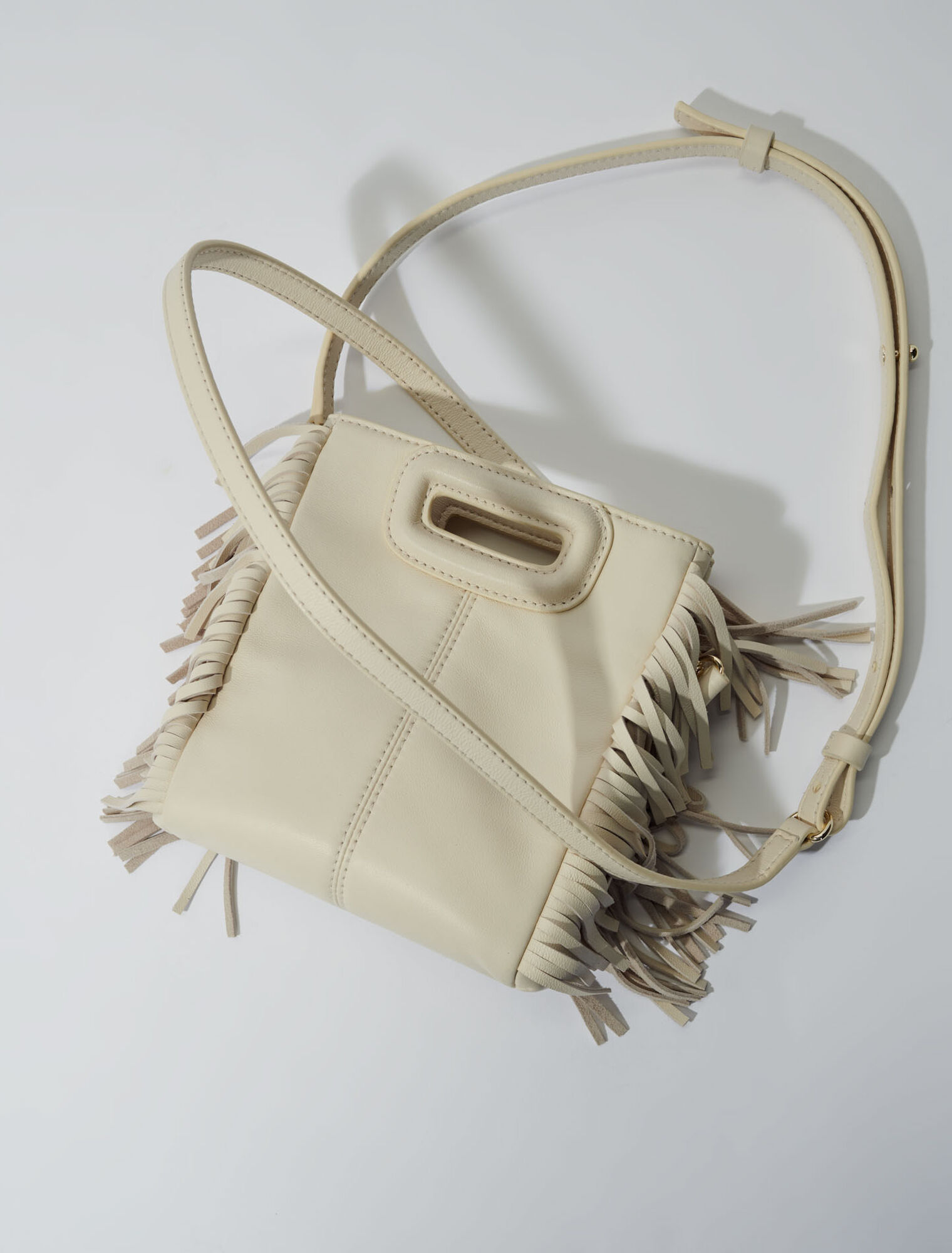Studded M quilted leather mini bag