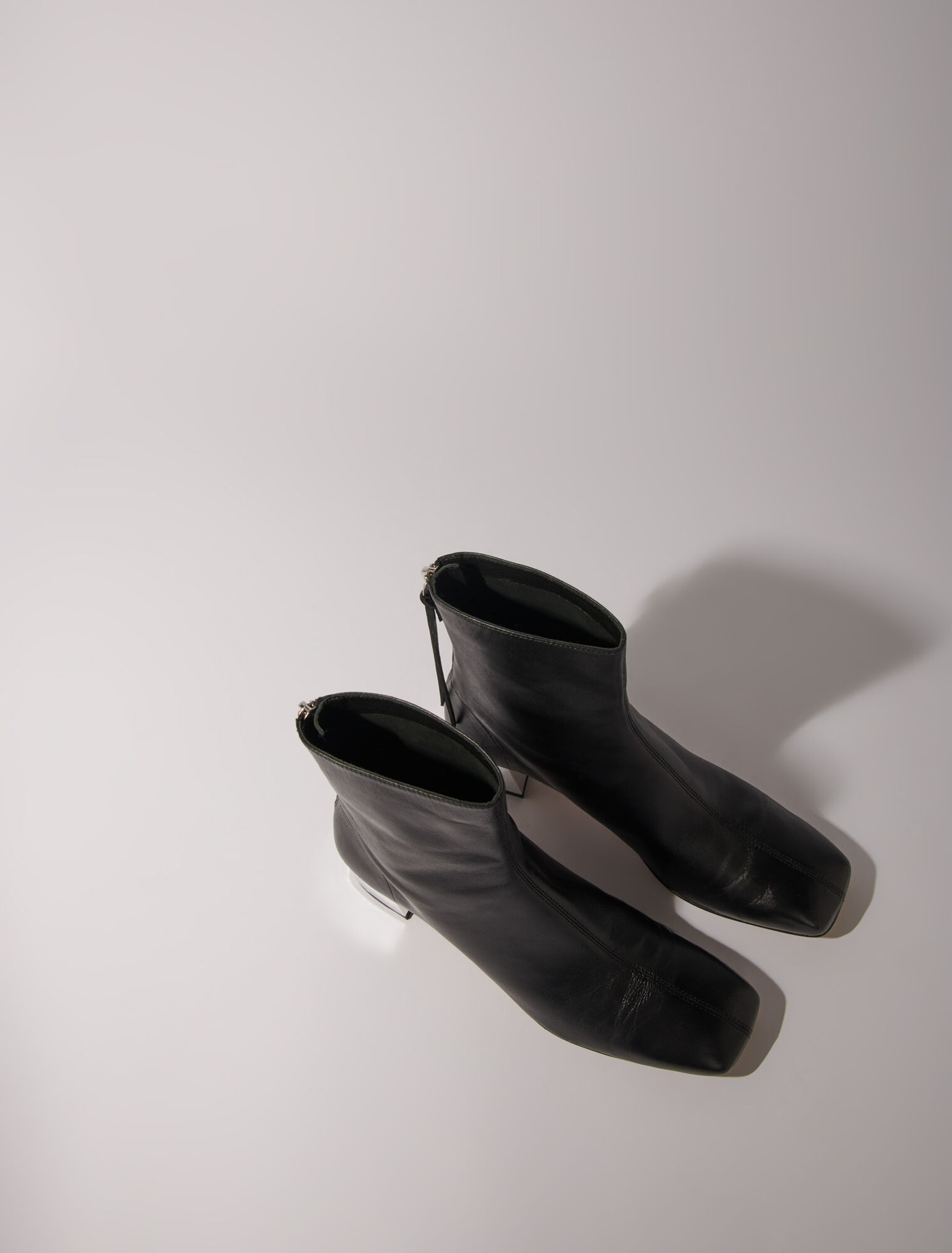 Square-toed leather boots