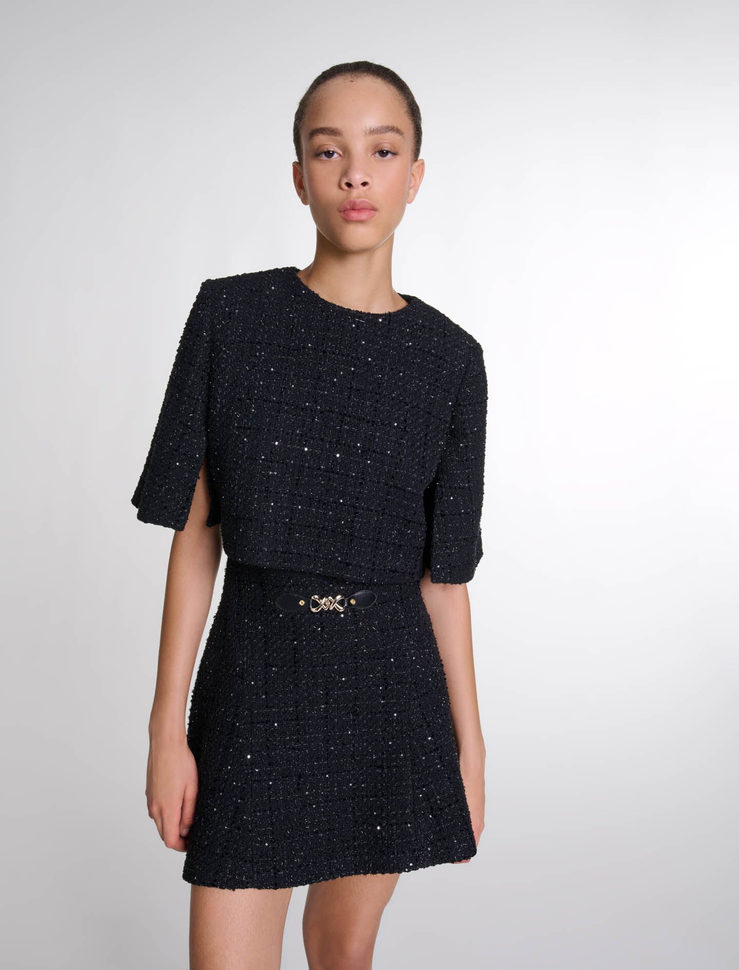 Short tweed dress with accentuated waist