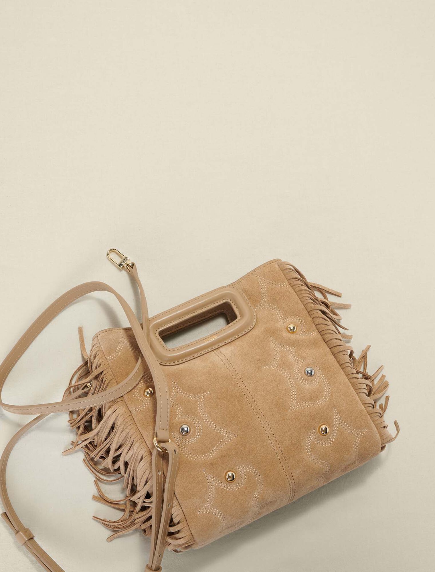 Embroidered studded leather M bag
