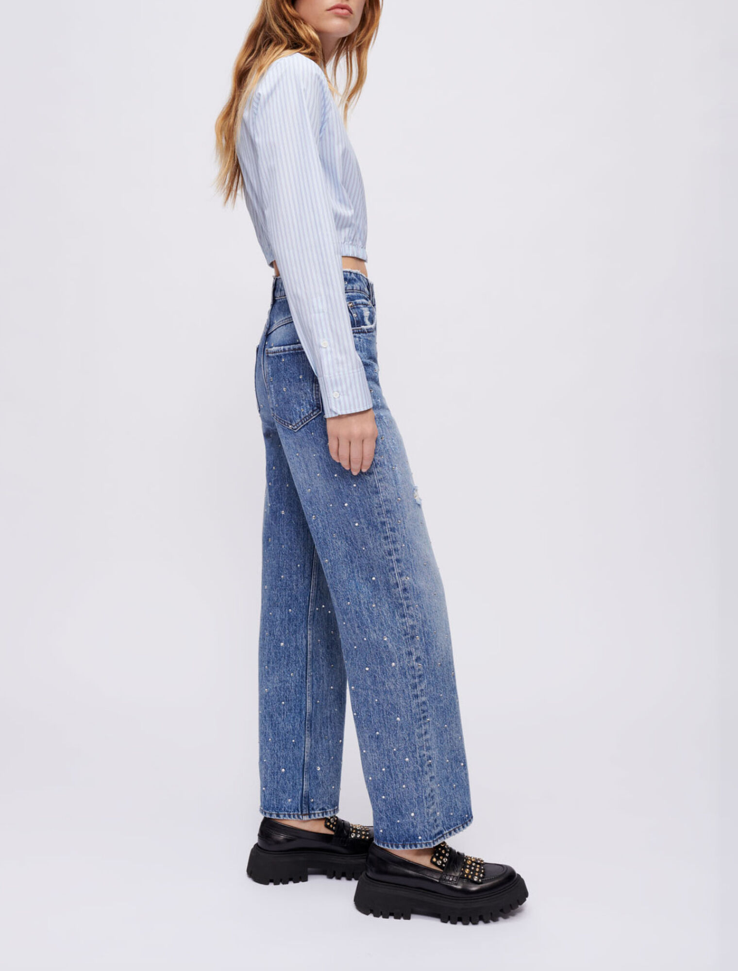 High-waisted jeans with rhinestones