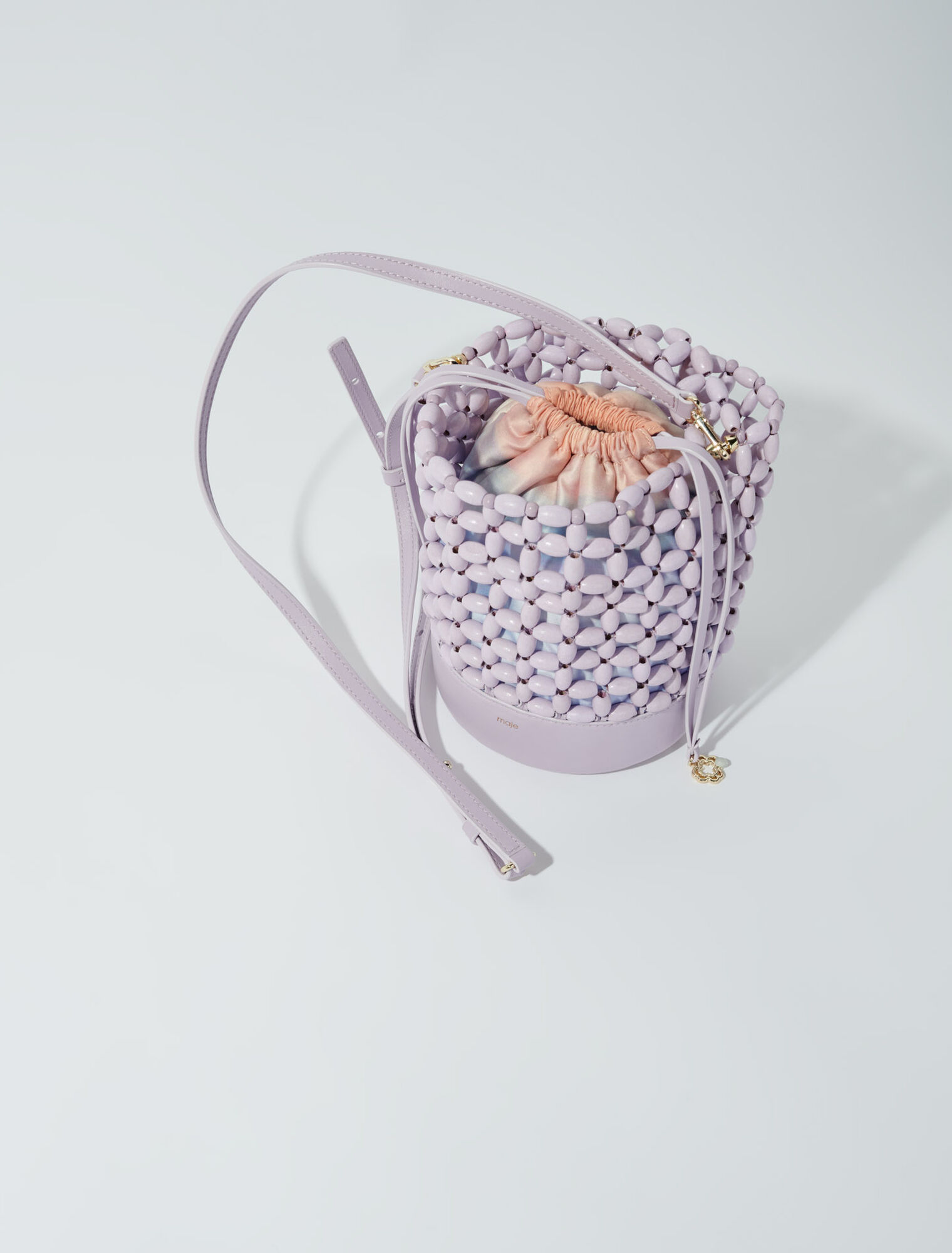 Bucket bag embellished with beads
